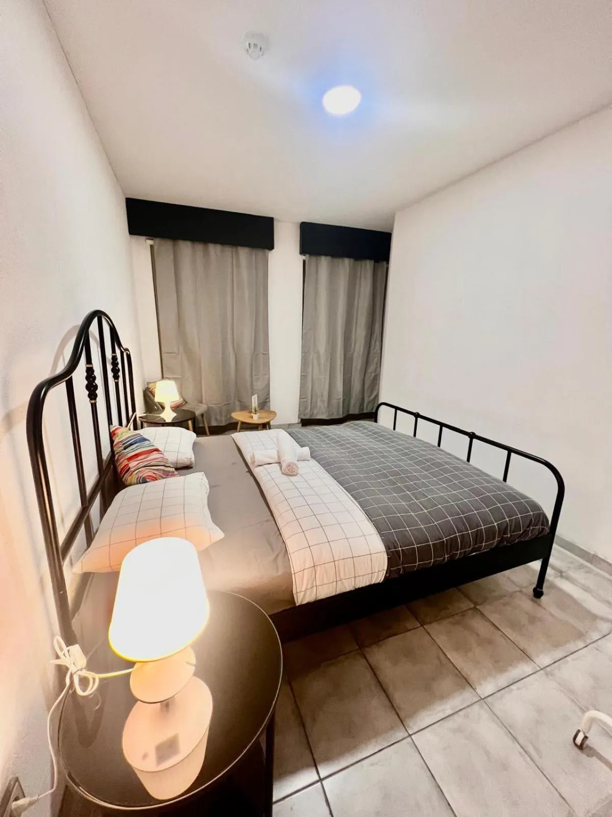 Bed in SwissPorto Guest House