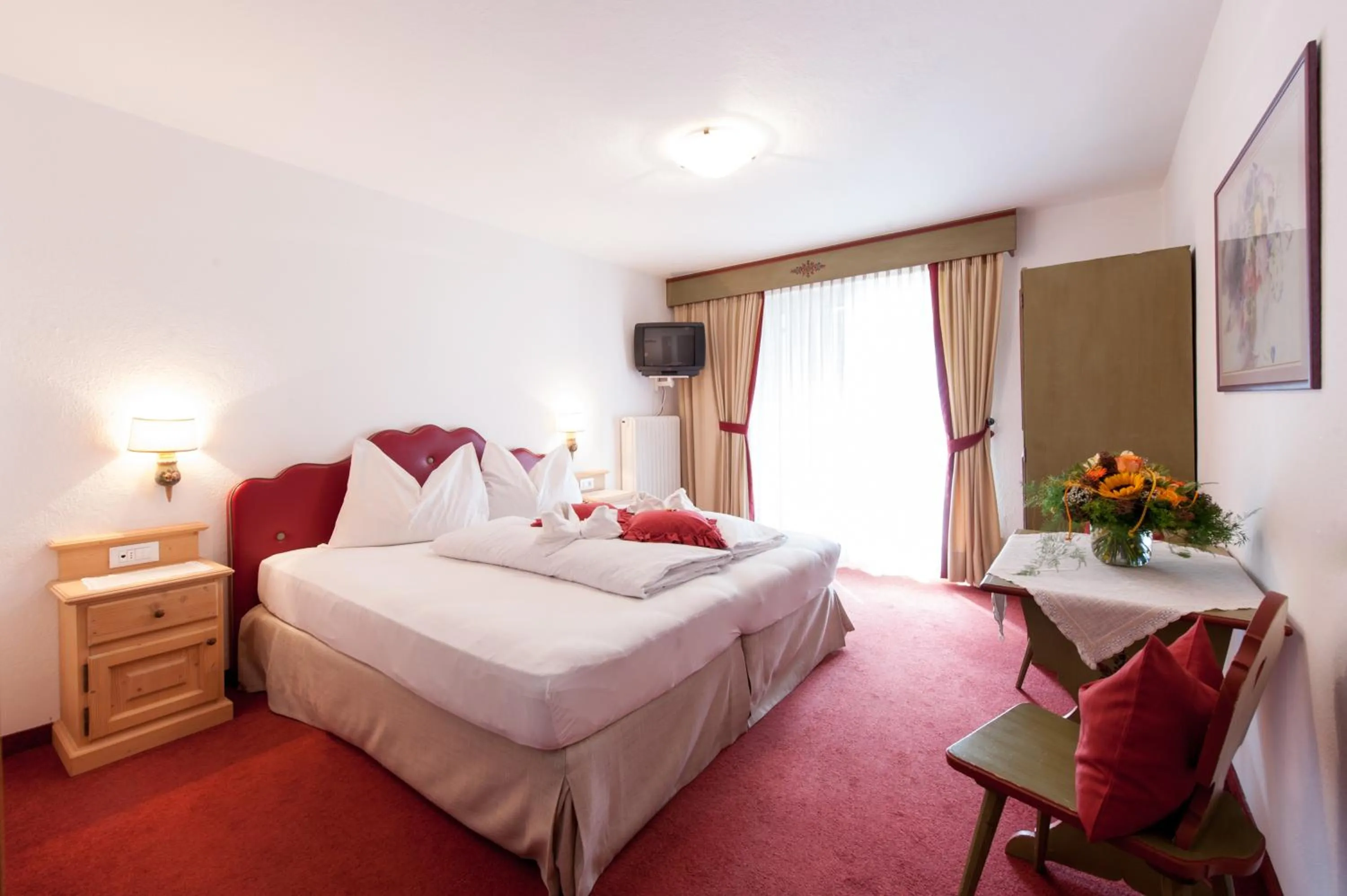 Decorative detail, Bed in PALMENGARTEN Hotel Gstör