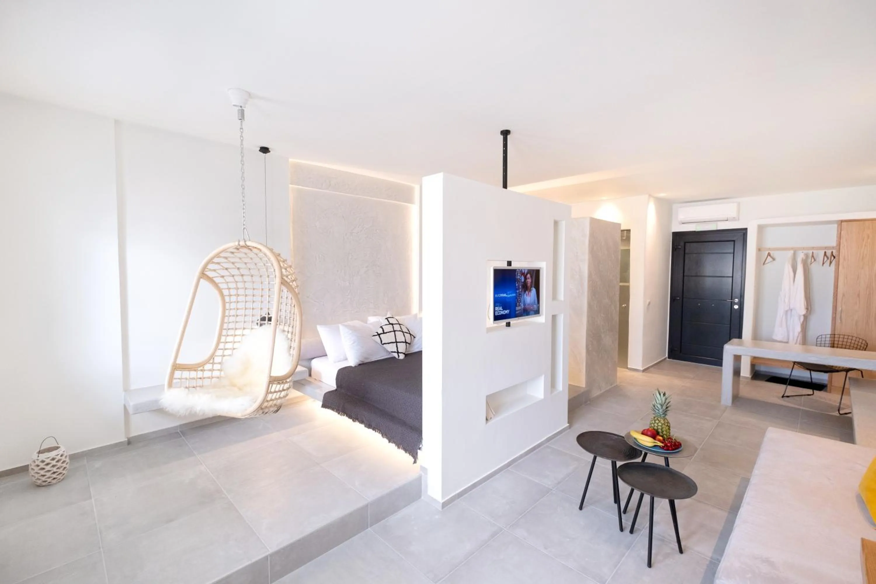 Photo of the whole room, Bed in George & Joanna Suites Santorini