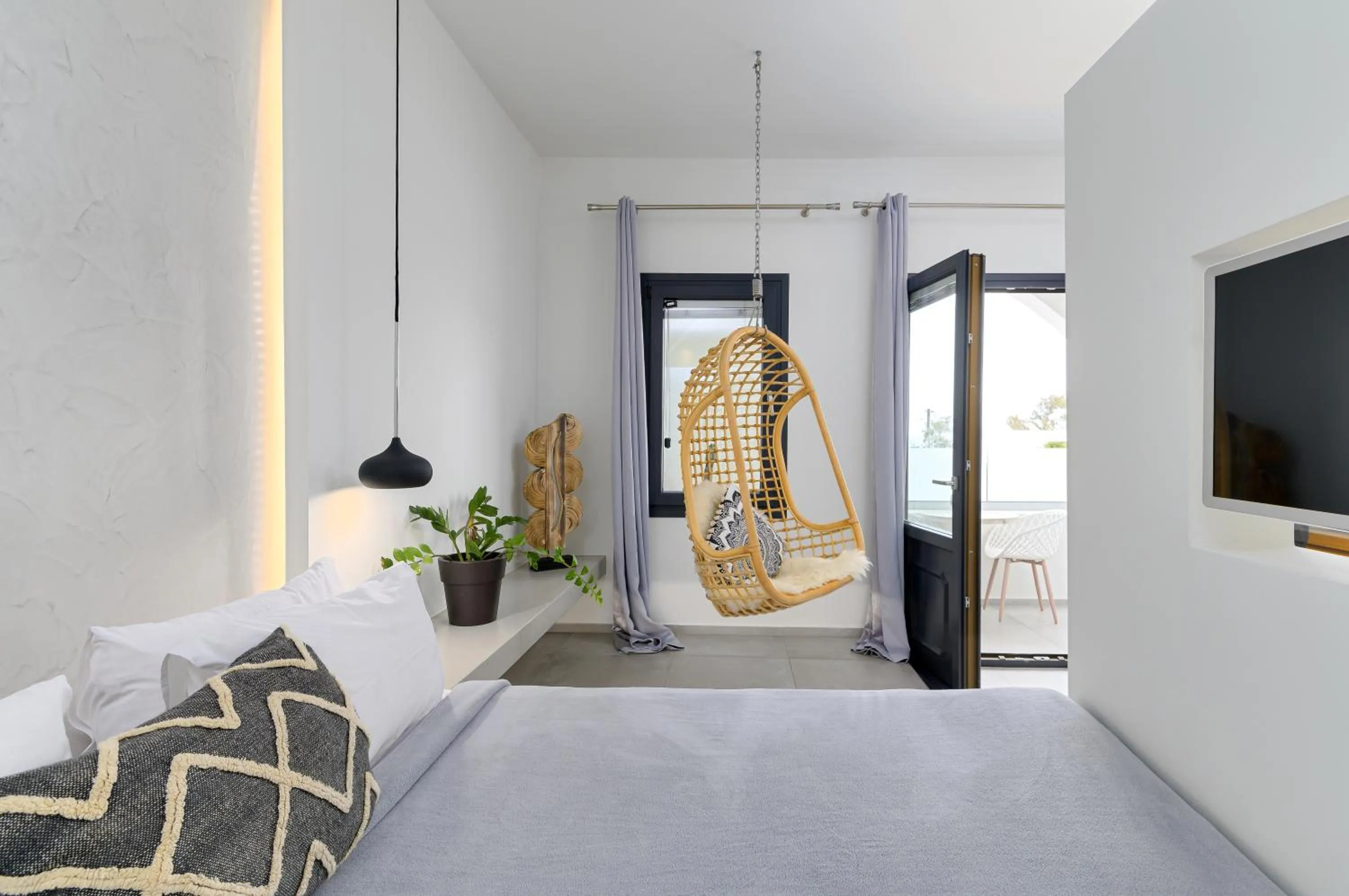 Bed in George & Joanna Suites Santorini