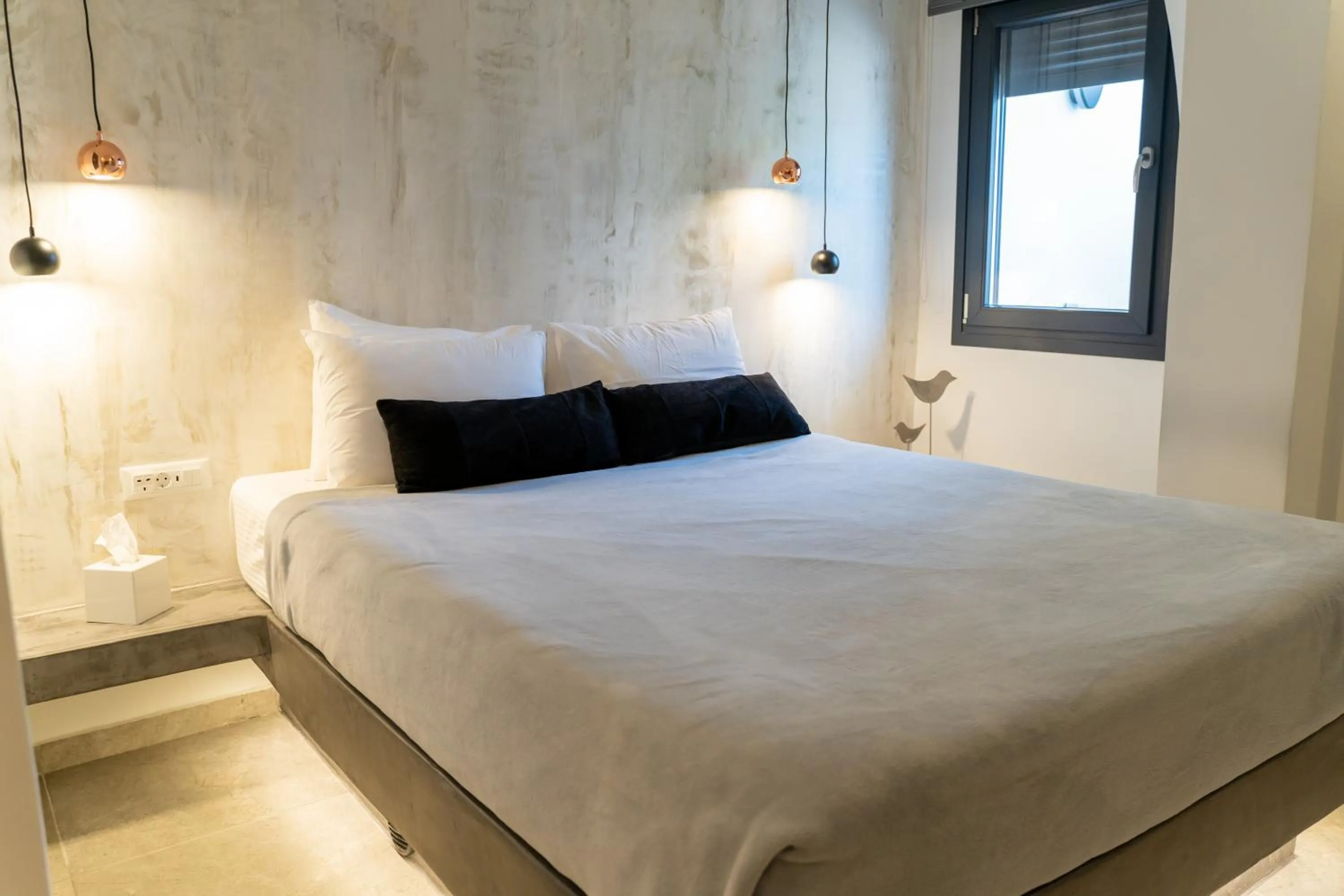 Bed in George & Joanna Suites Santorini