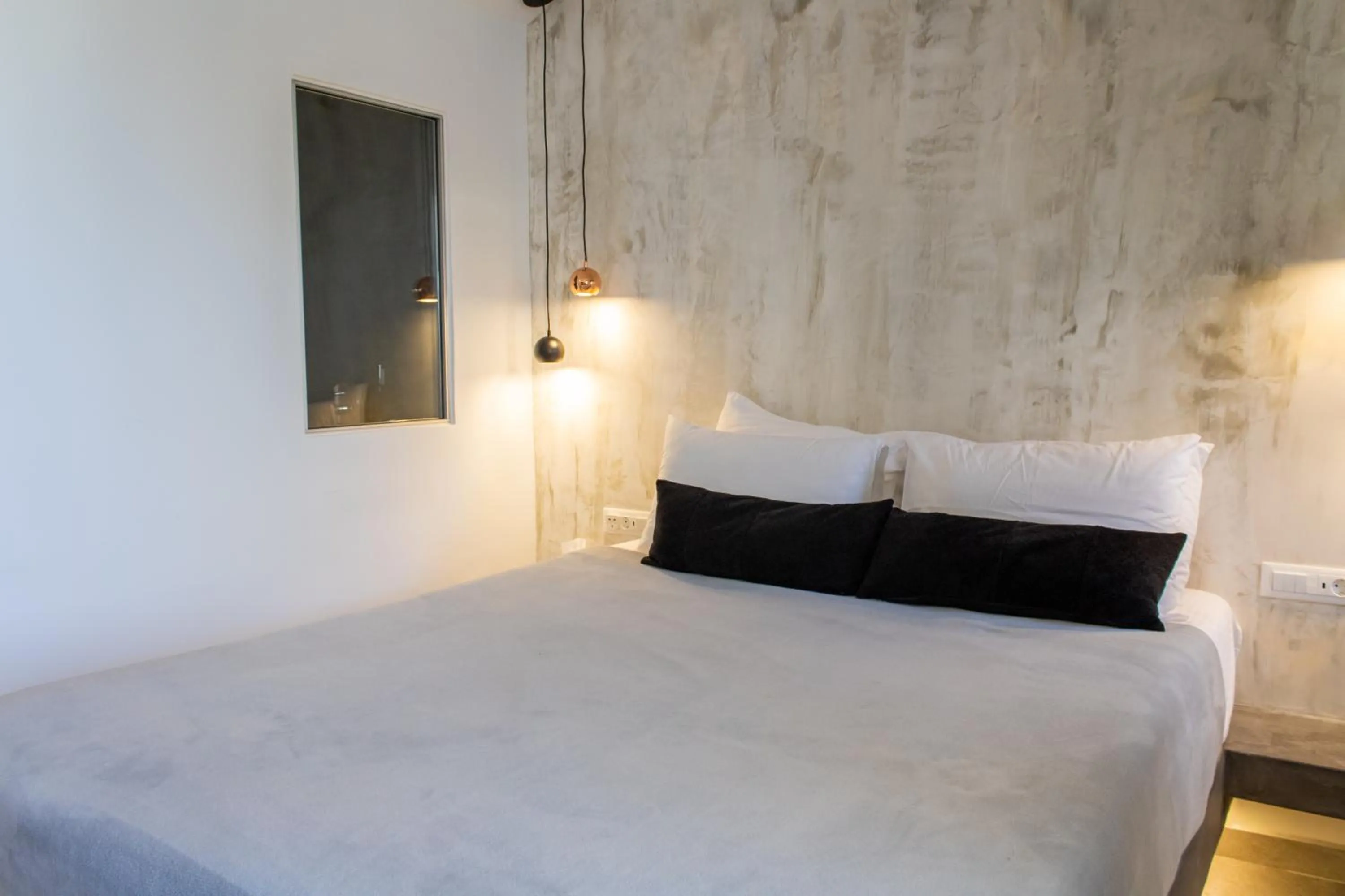 Bed in George & Joanna Suites Santorini