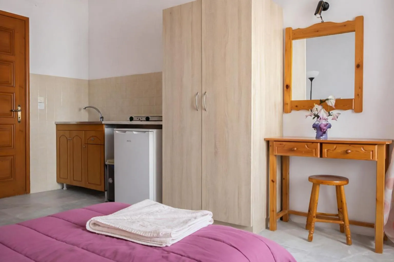 Bed in Ionian Breeze Apartments