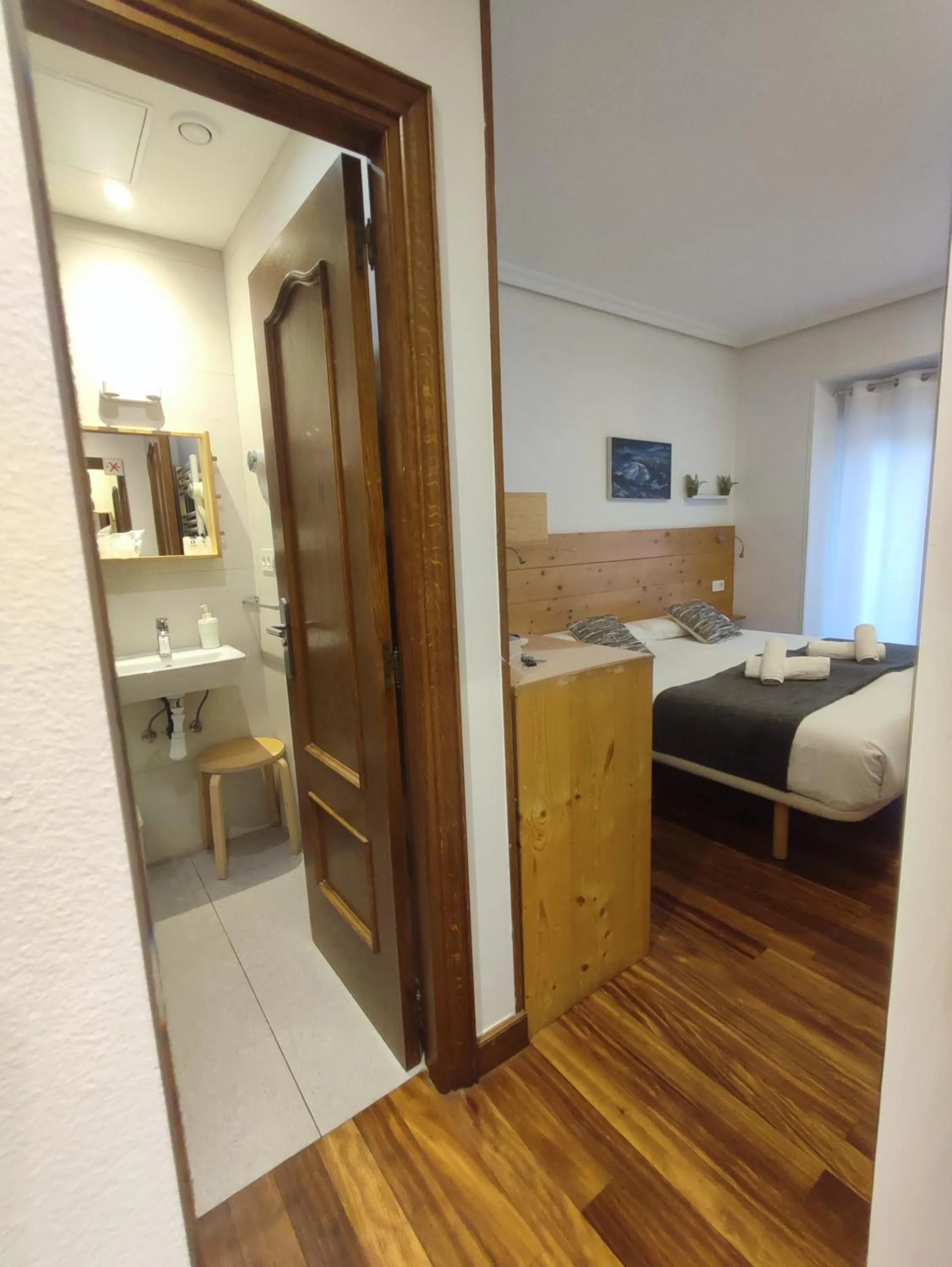 Bathroom, Bed in Pensión Urkia