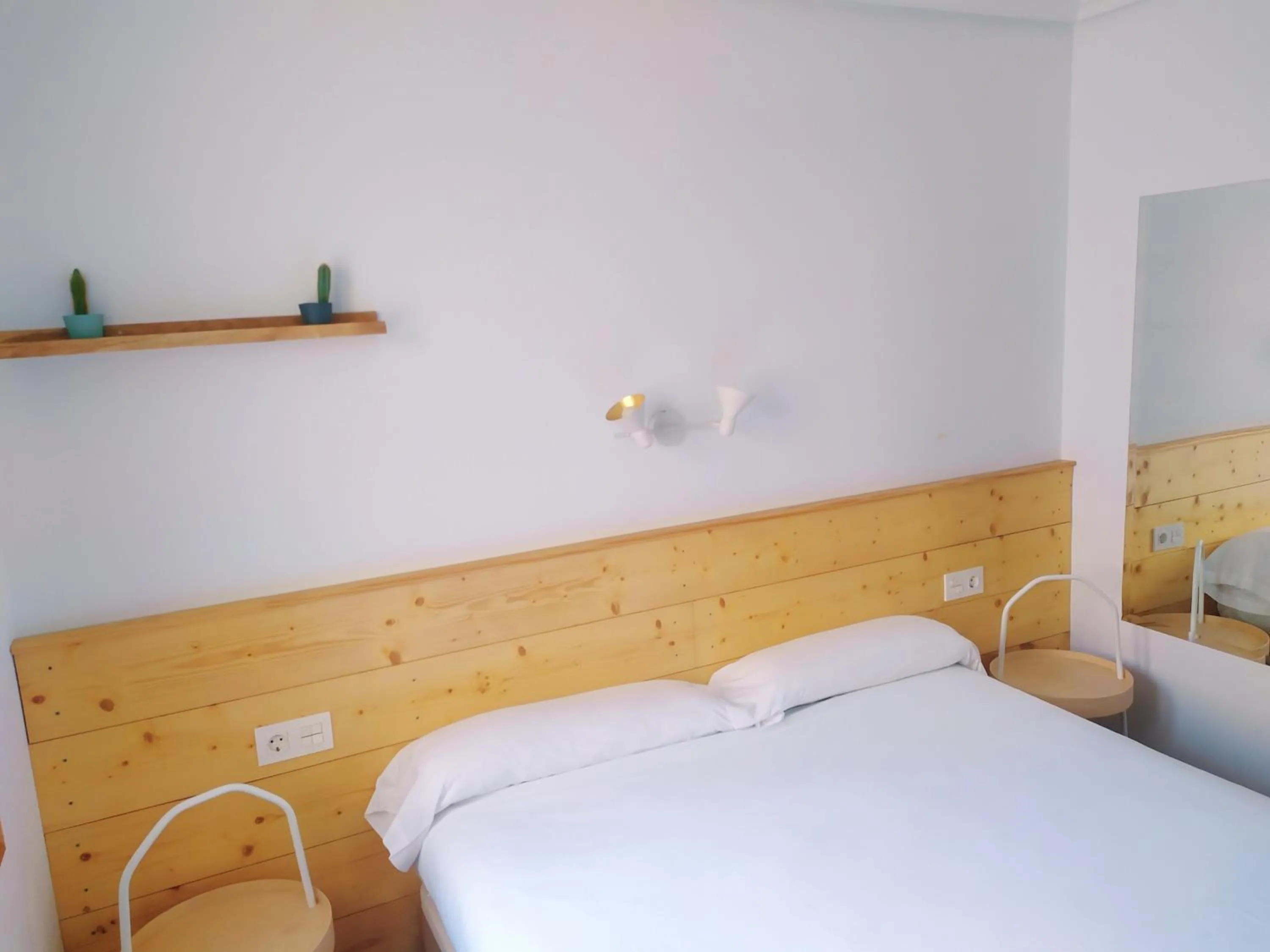 Bed in Pensión Urkia