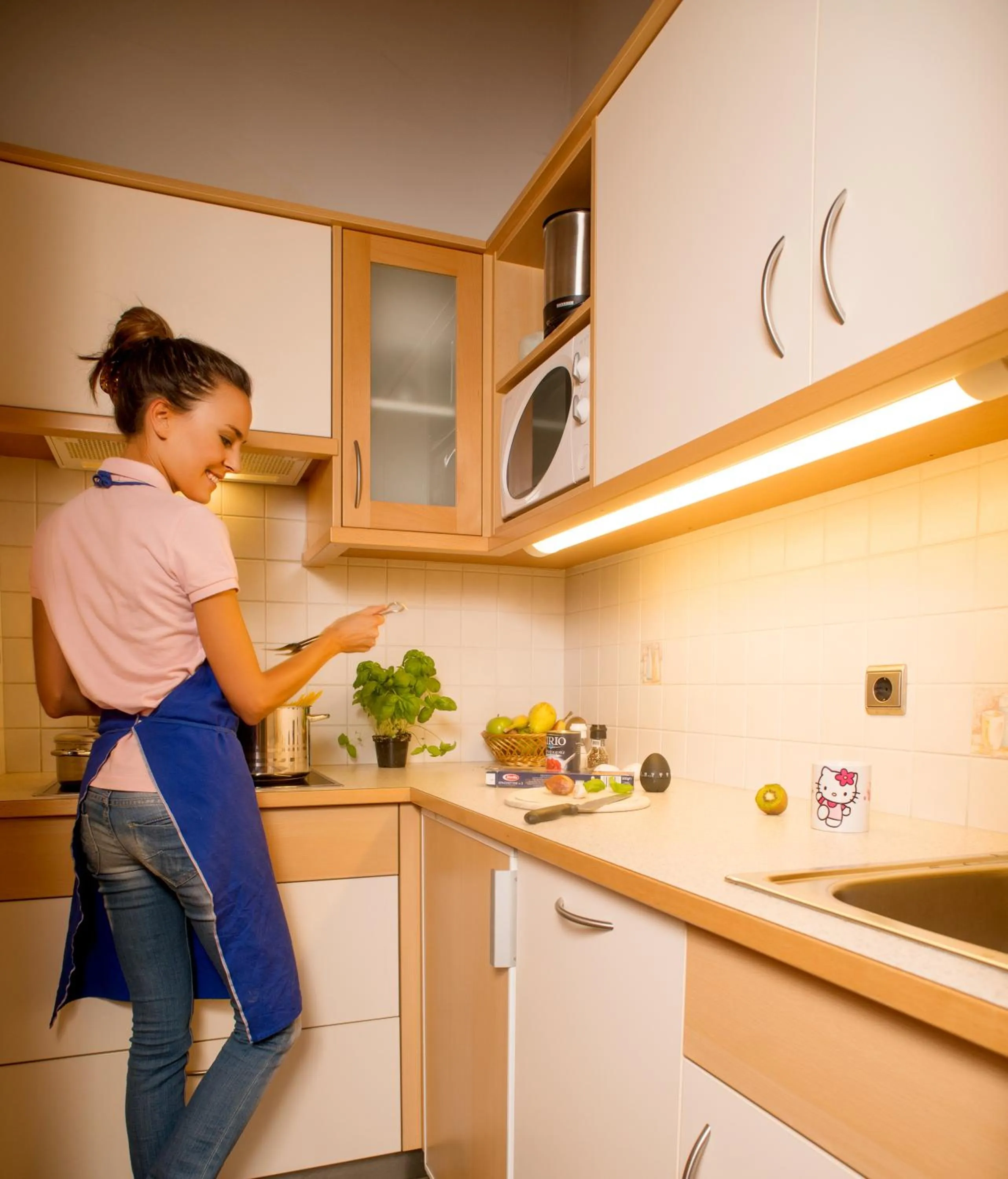 Kitchen or kitchenette in Aparthotel Kastel Seiser Alm