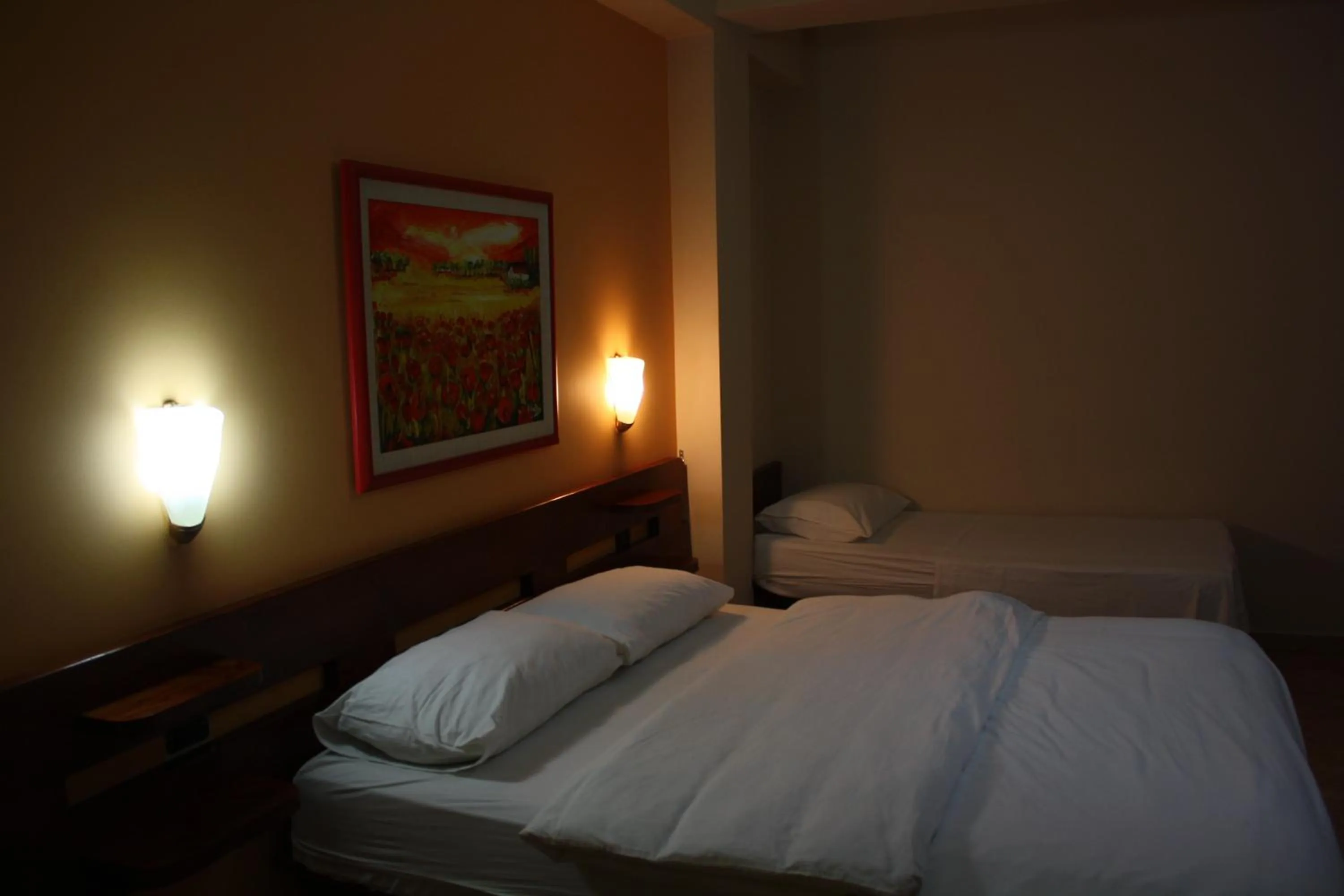 cot in Hotel Martini