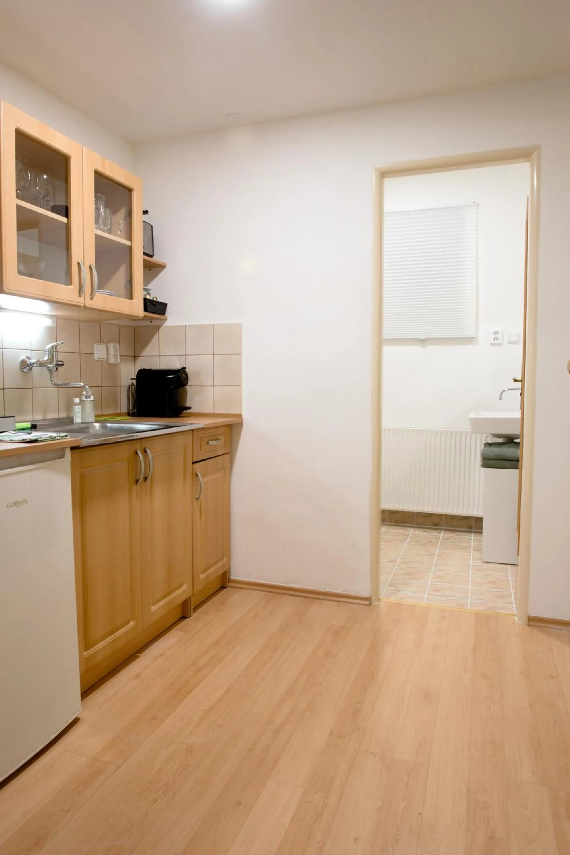 Kitchen or kitchenette in Apartmány Bramborka