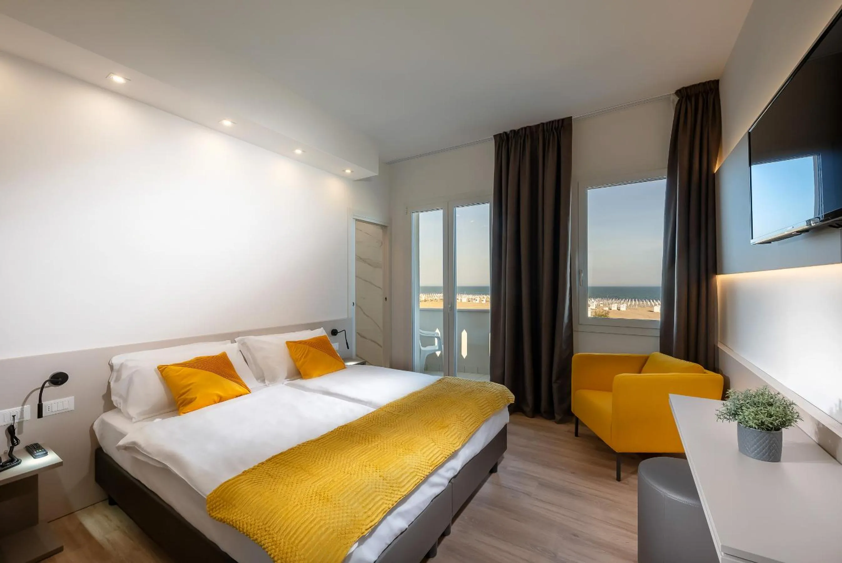 Bed in Hotel Delfino