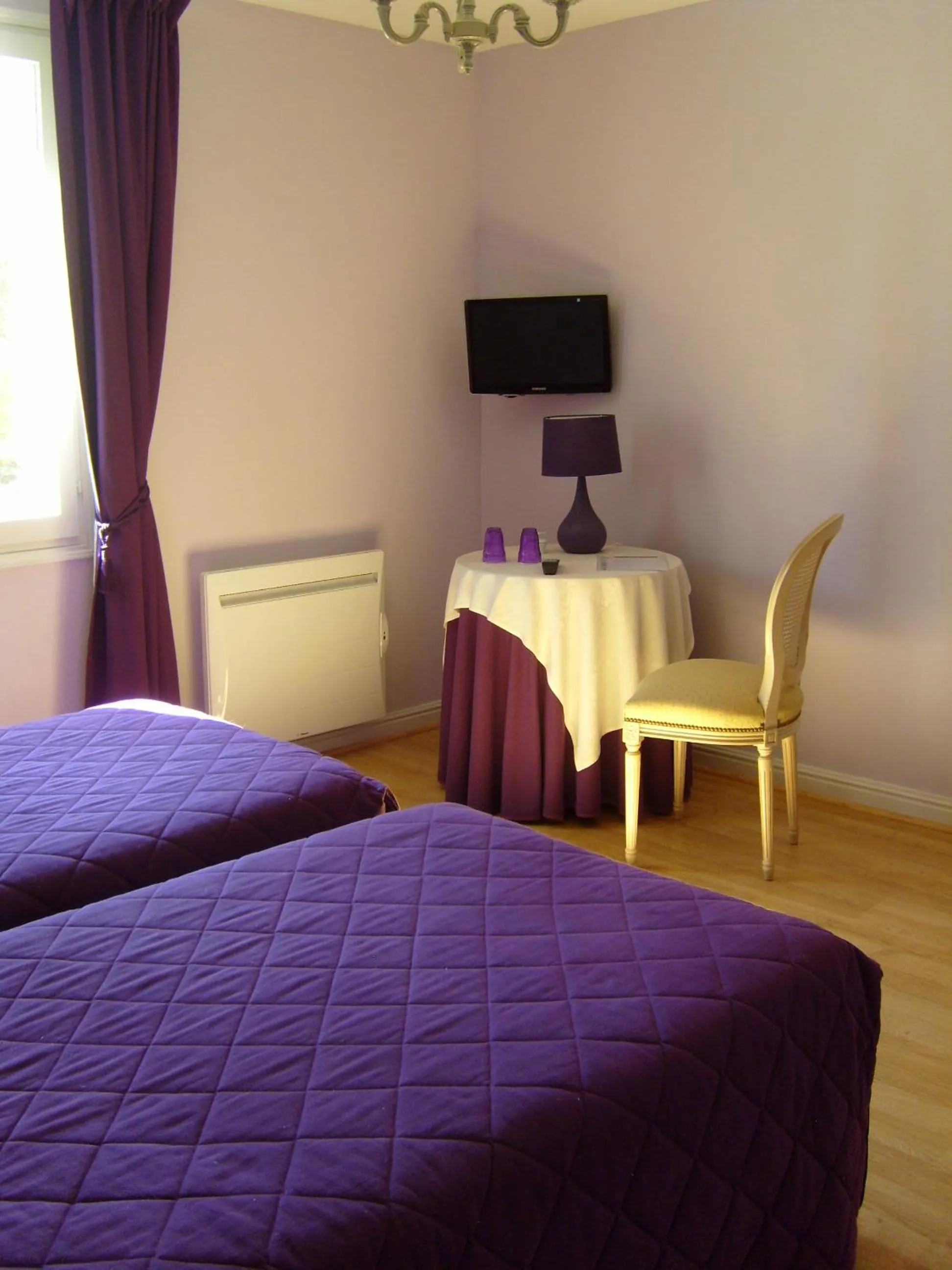 Photo of the whole room, Bed in Hostellerie le Clos du Cher