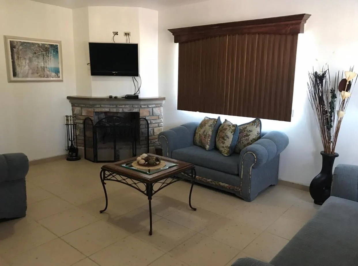 Communal lounge/ TV room in Finca Chavez