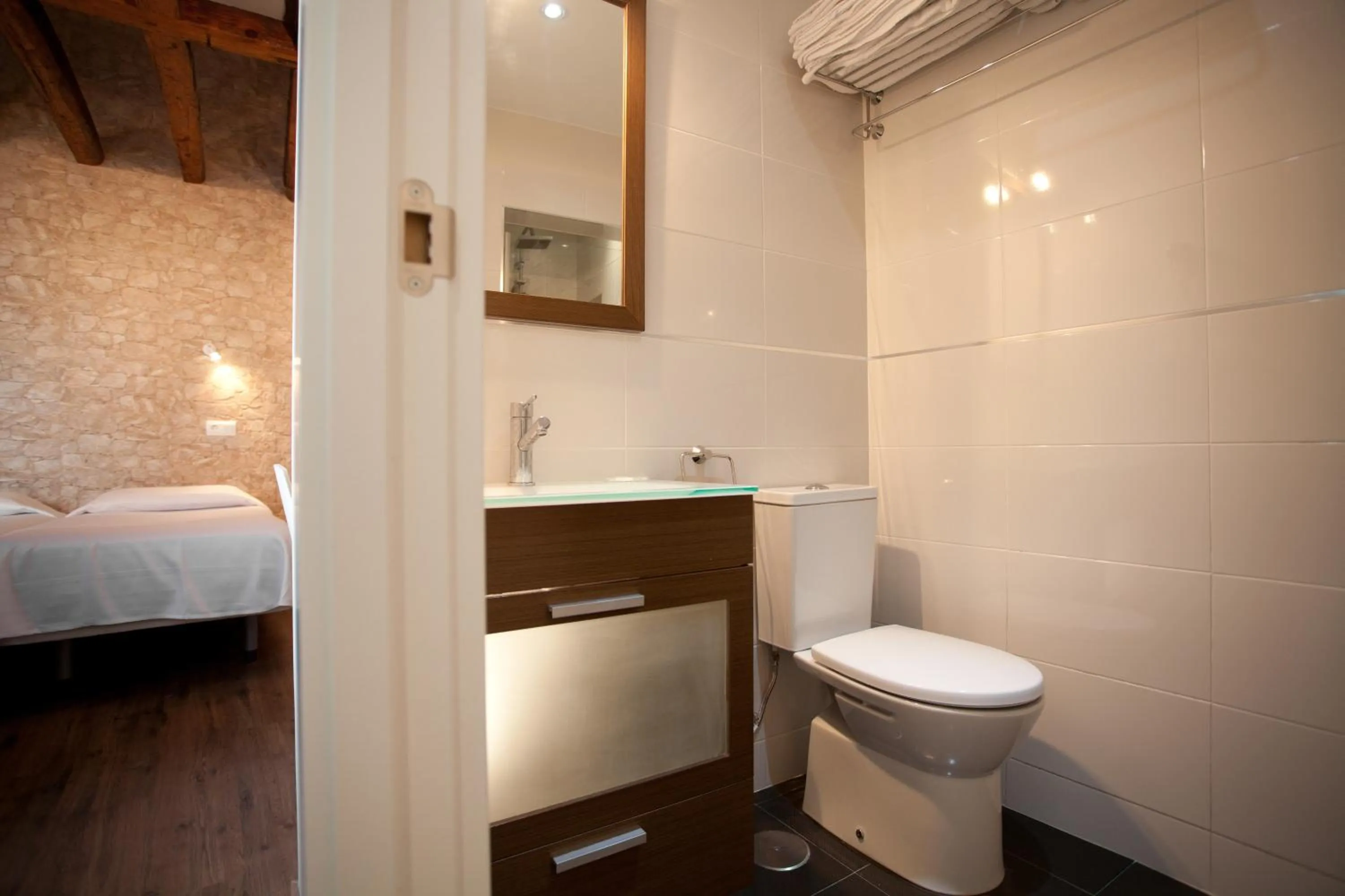 Toilet, Bed in Suites You Nickel