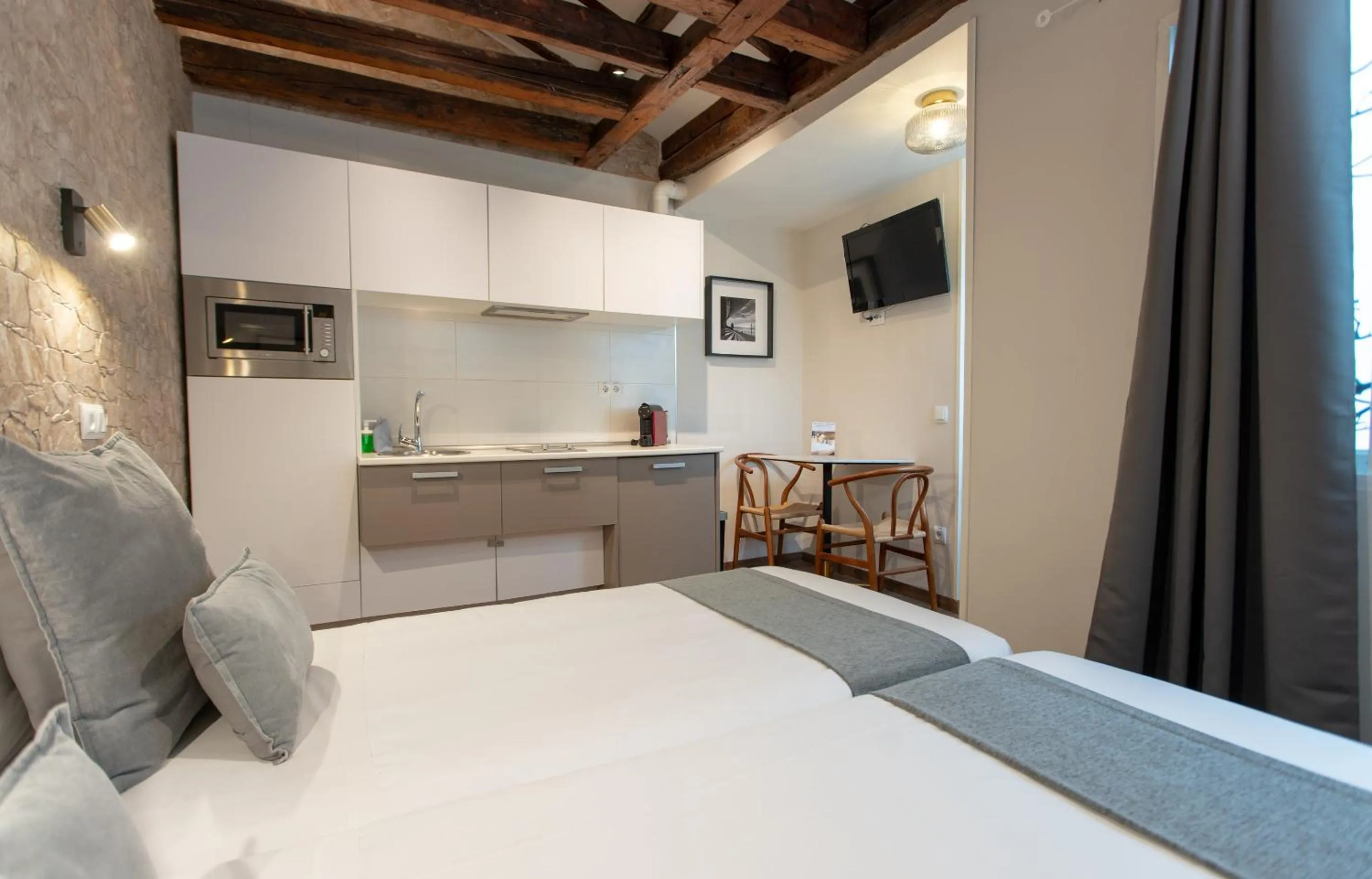 kitchen, Bed in Suites You Nickel