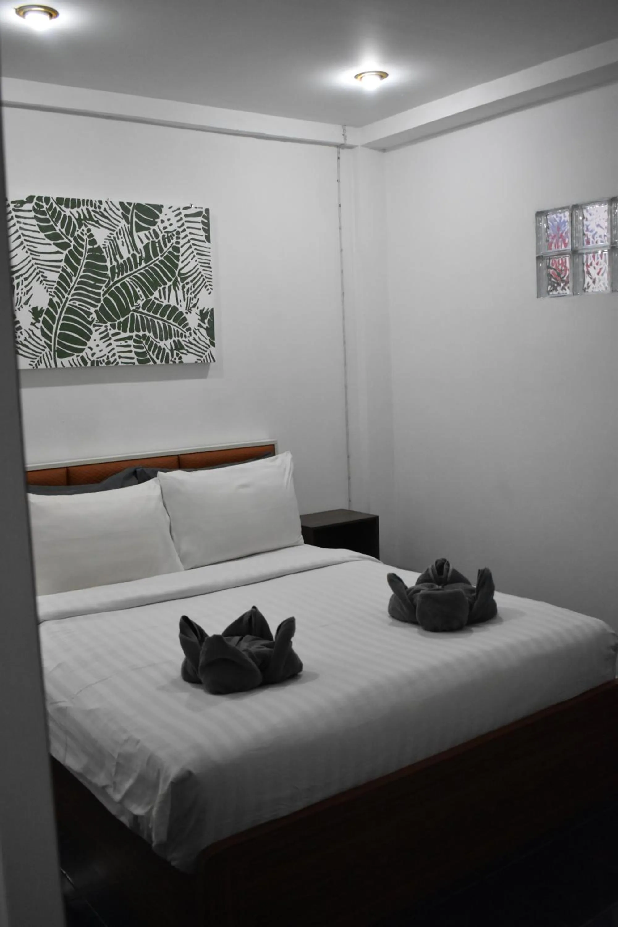 Bed in Sala Bua Room