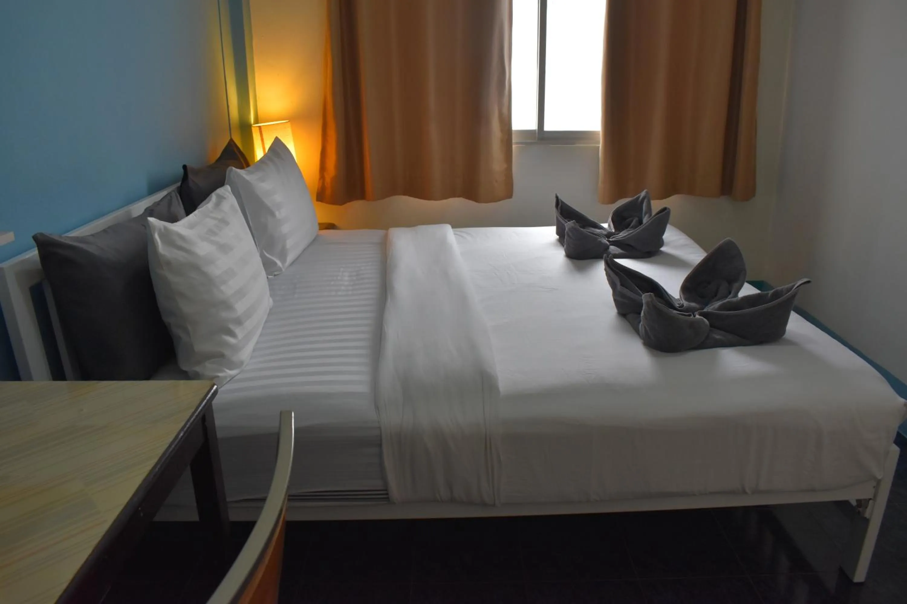 Bed in Sala Bua Room