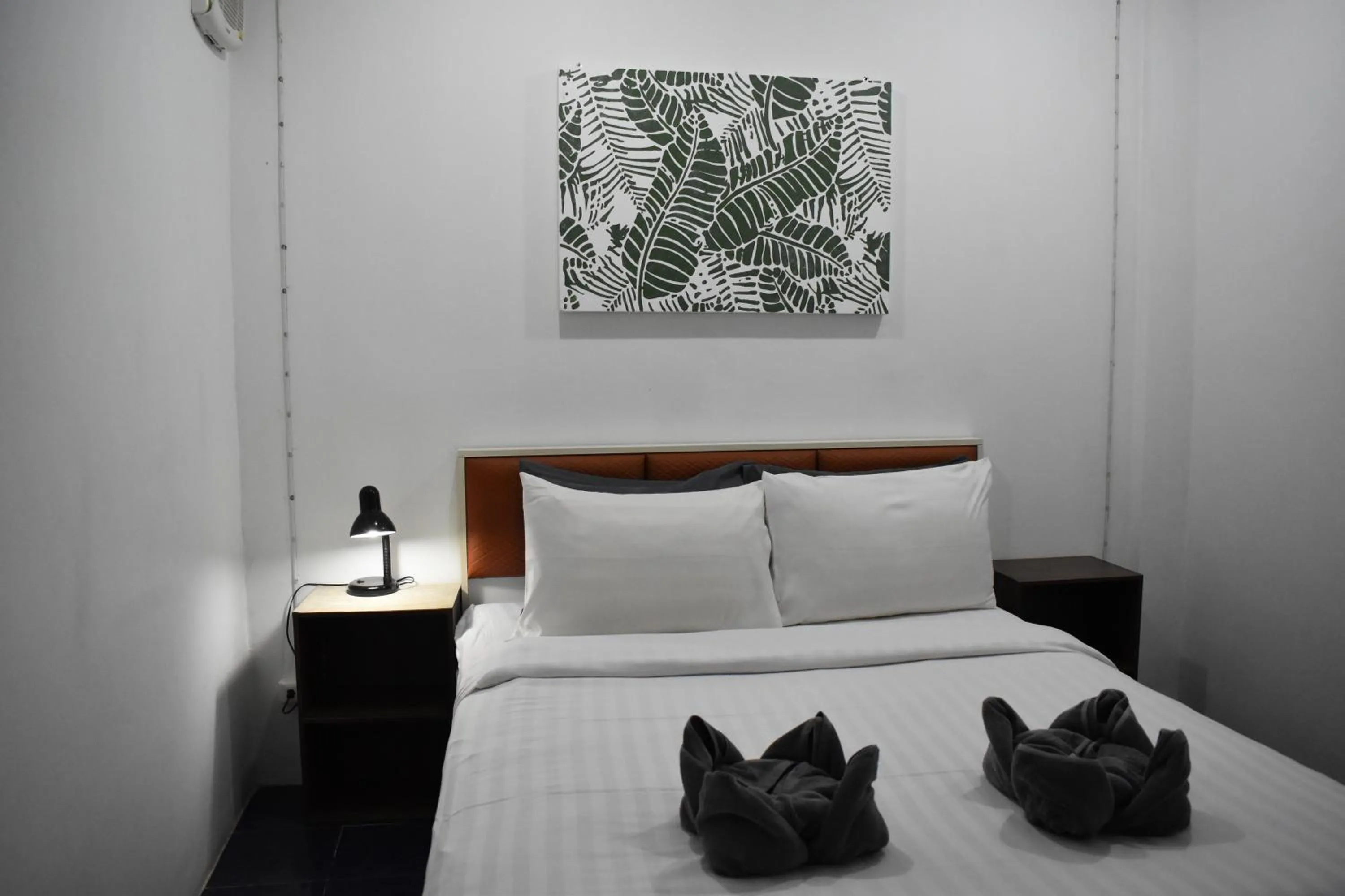 Bed in Sala Bua Room