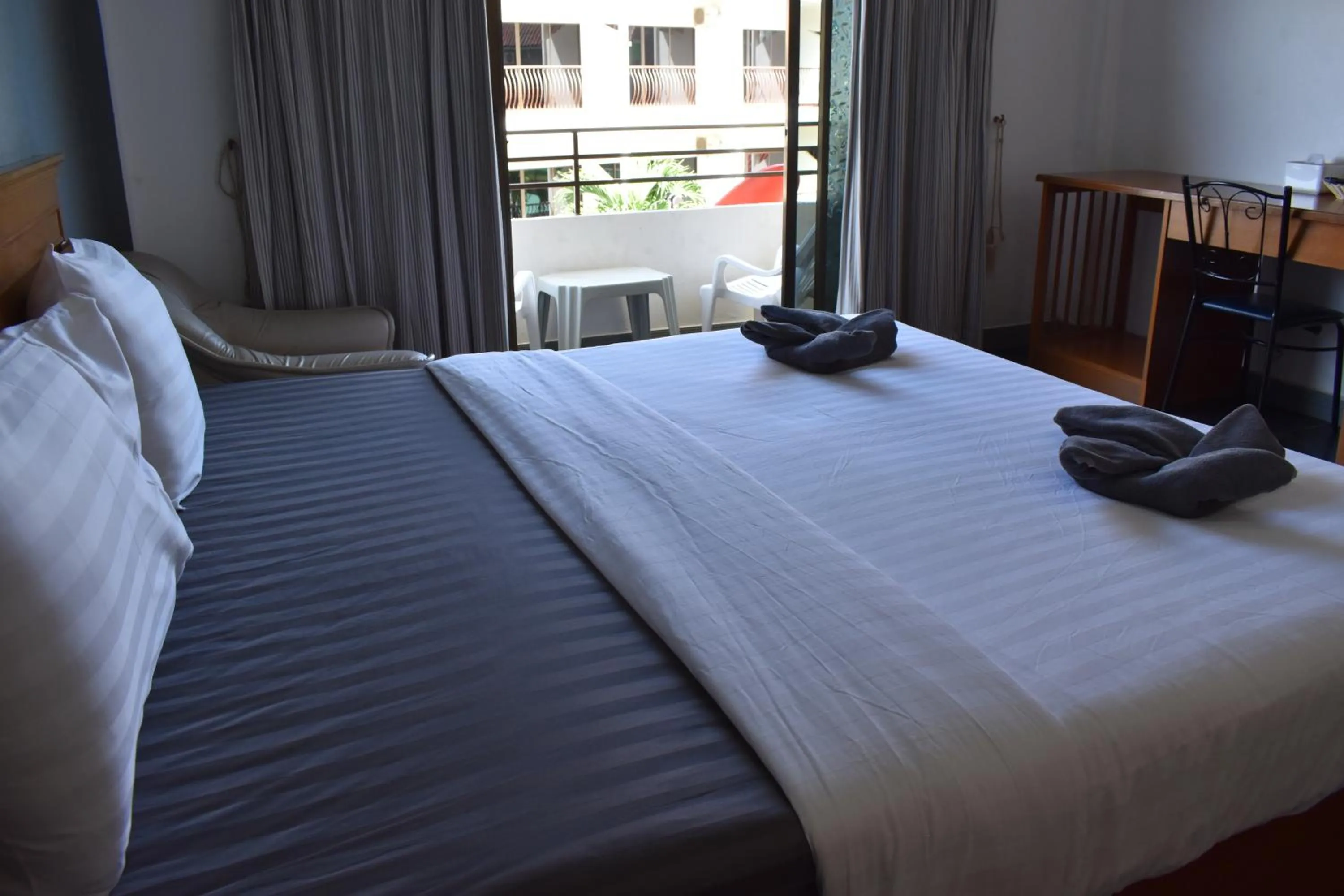 Bed in Sala Bua Room