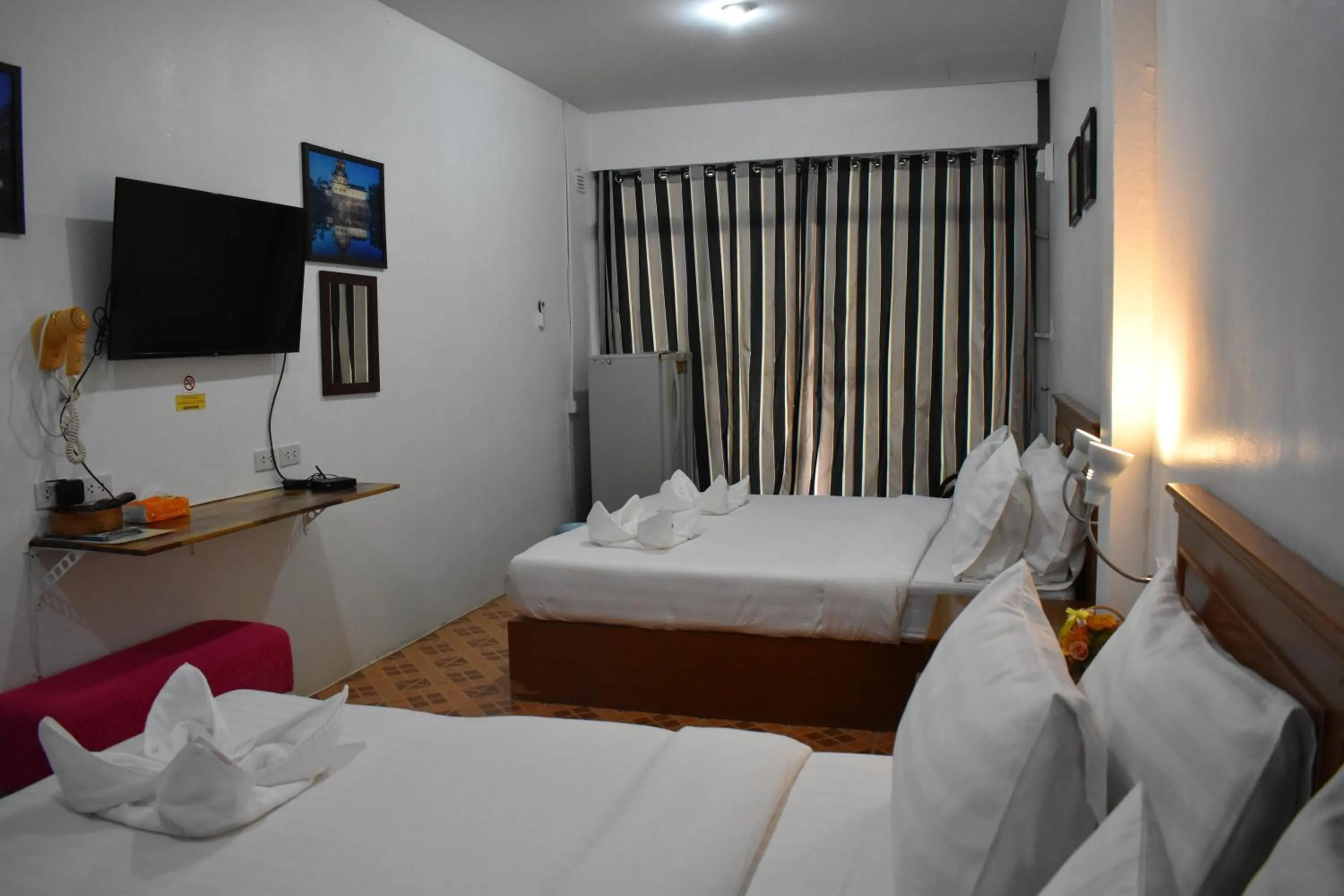 Photo of the whole room, Bed in Sala Bua Room