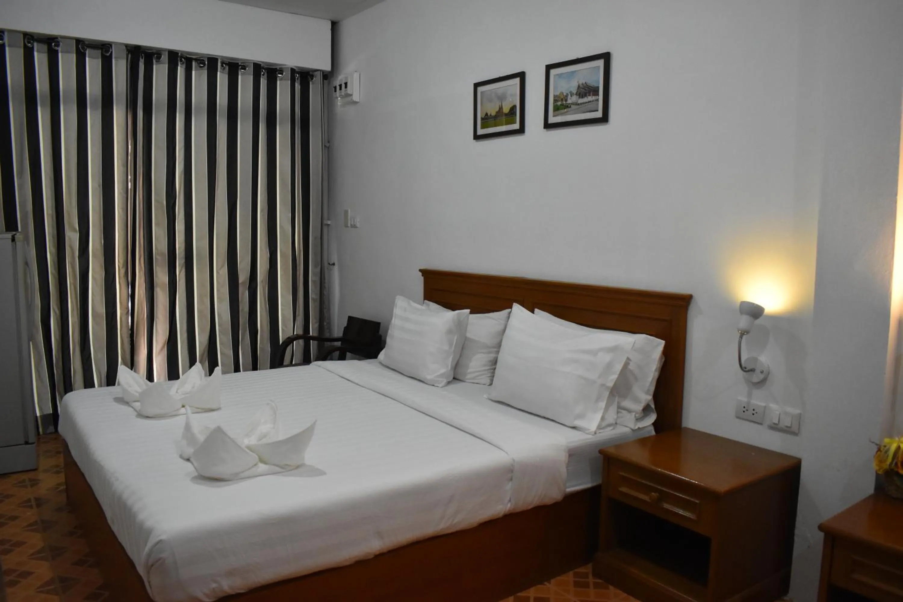 Bed in Sala Bua Room