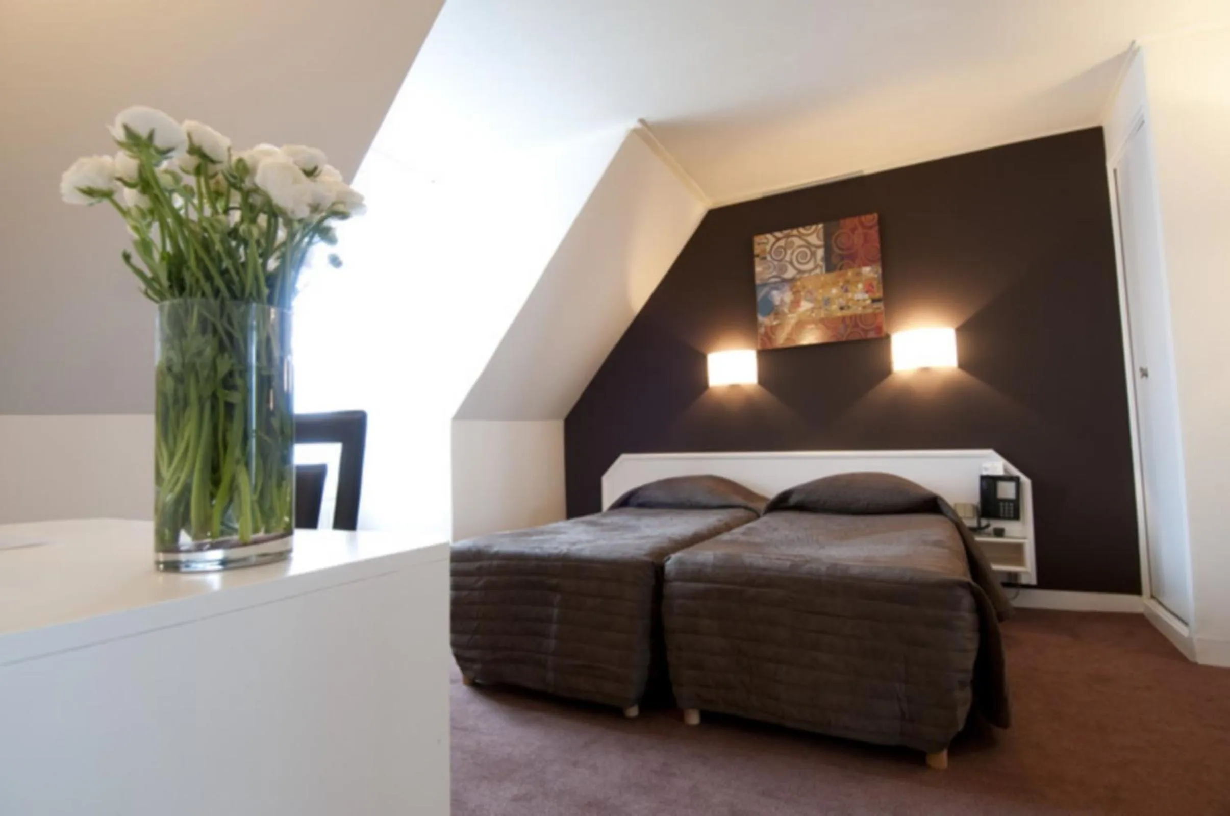 Bedroom in Hôtel de l'Alma by Malone