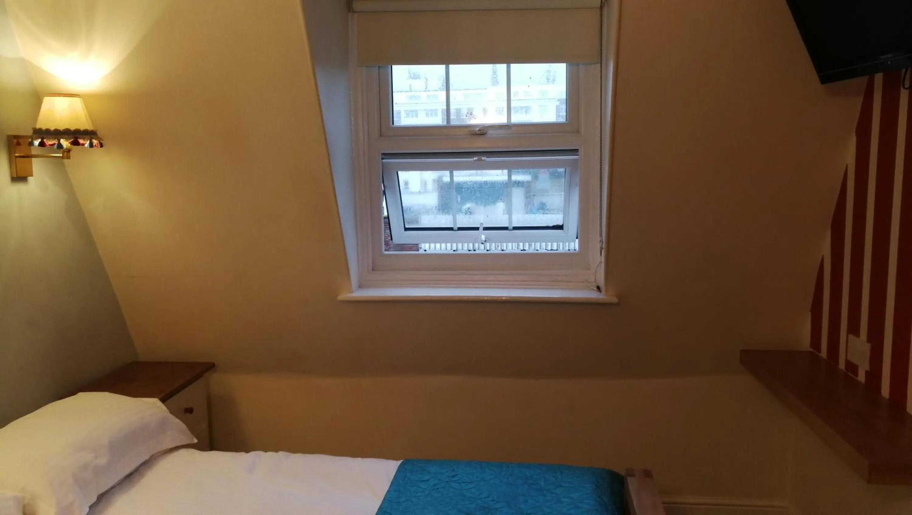 Bed in Regency Hotel