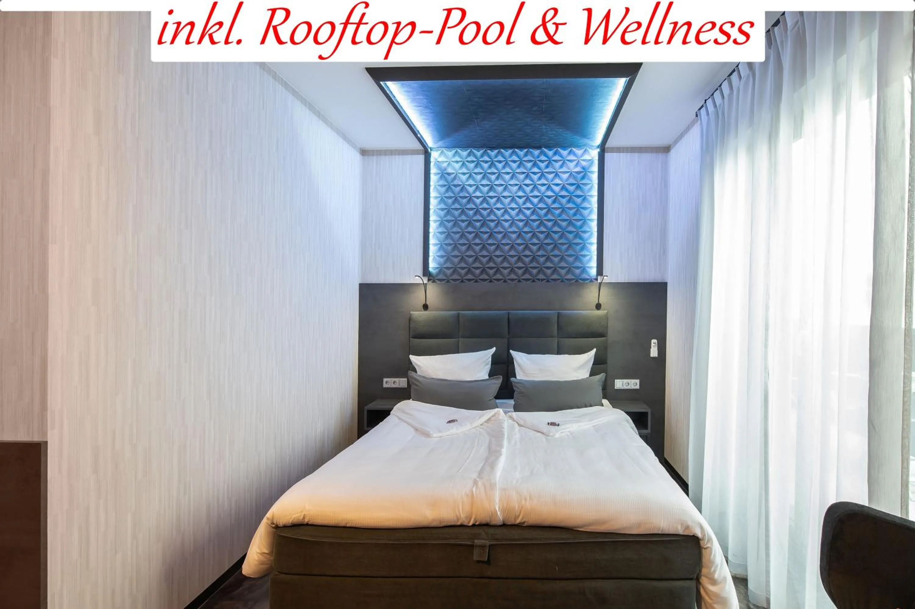 Photo of the whole room, Bed in premium by GS Hotel