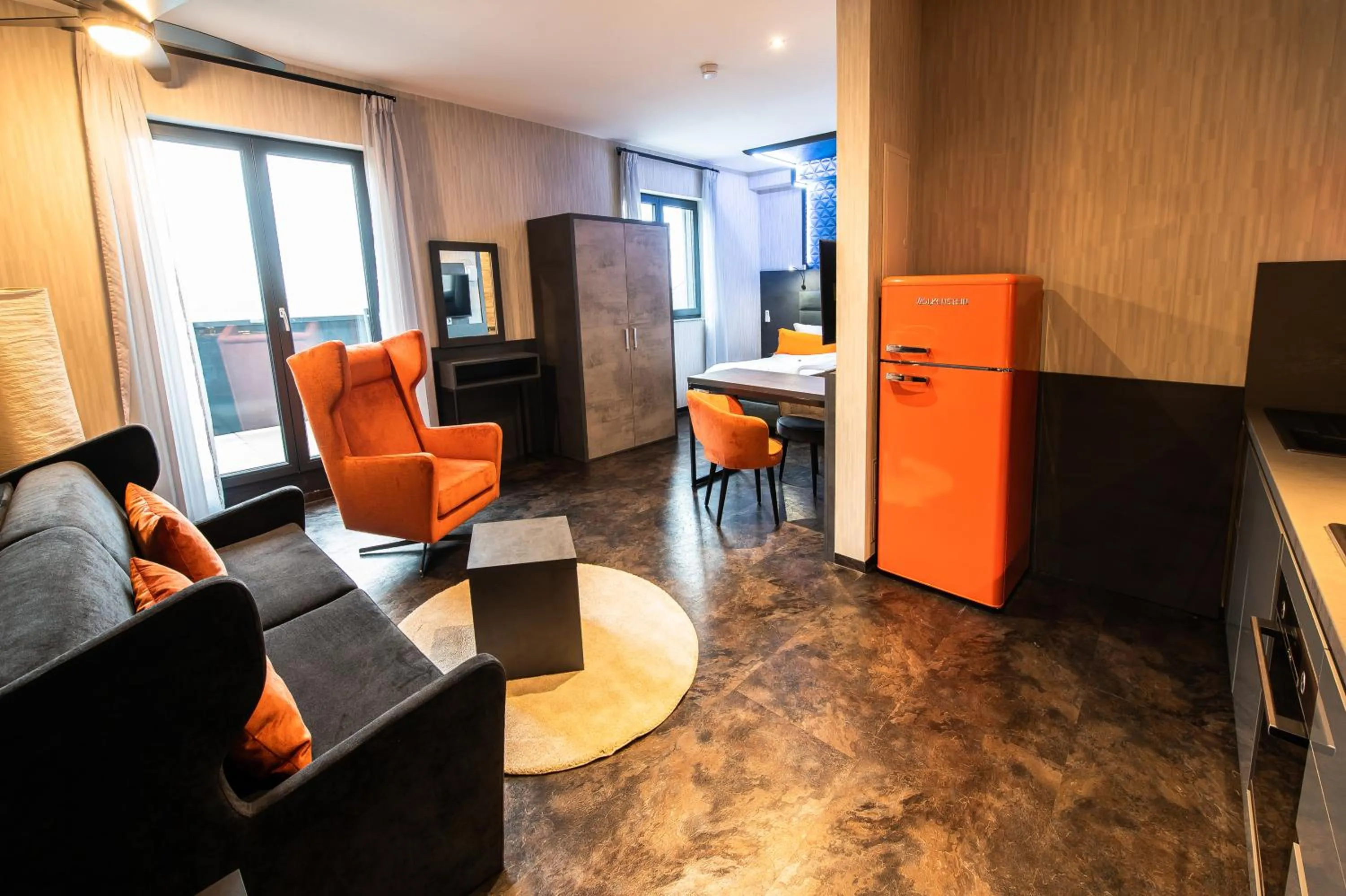 Living room in premium by GS Hotel