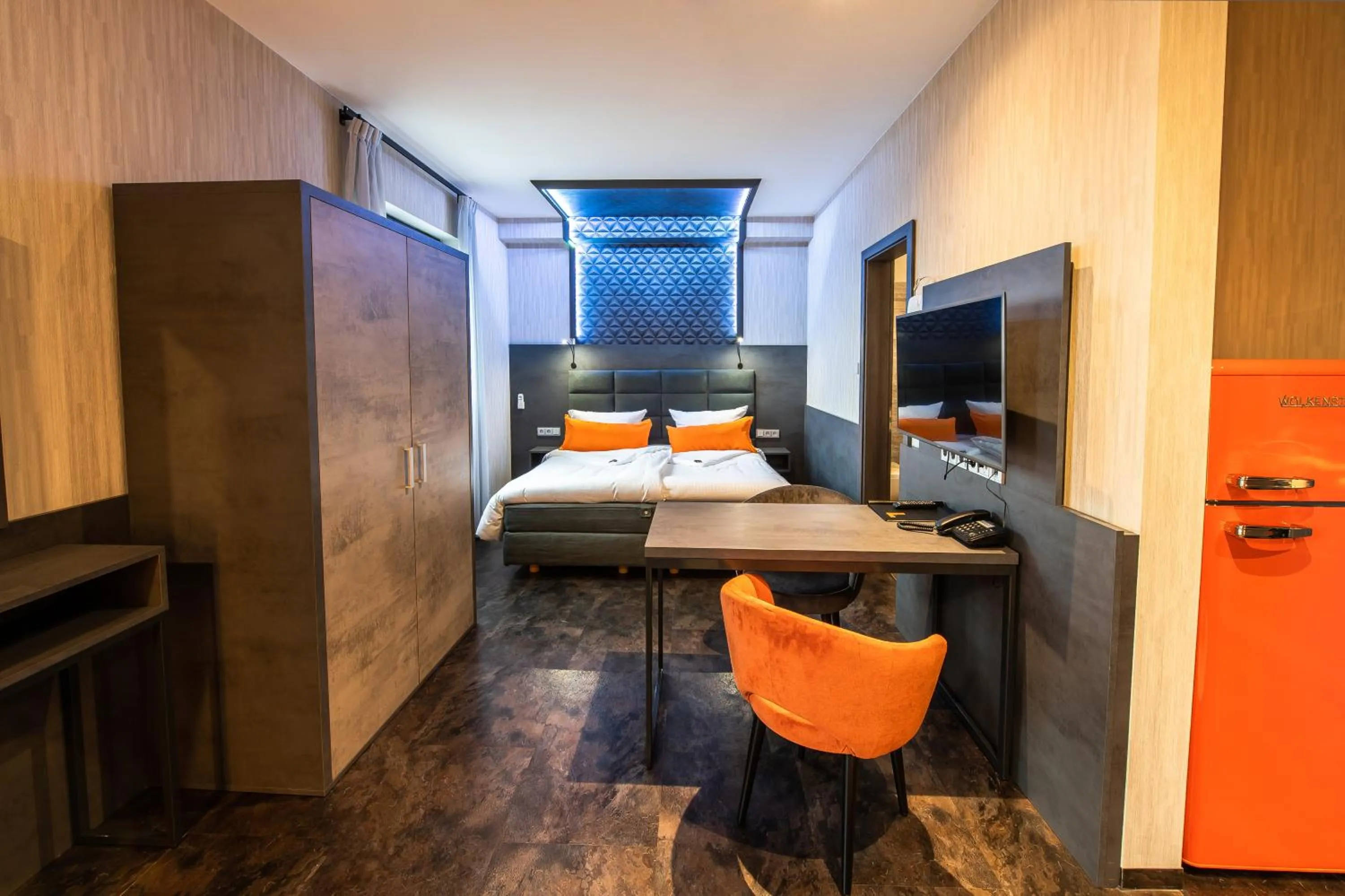 Photo of the whole room, Bed in premium by GS Hotel