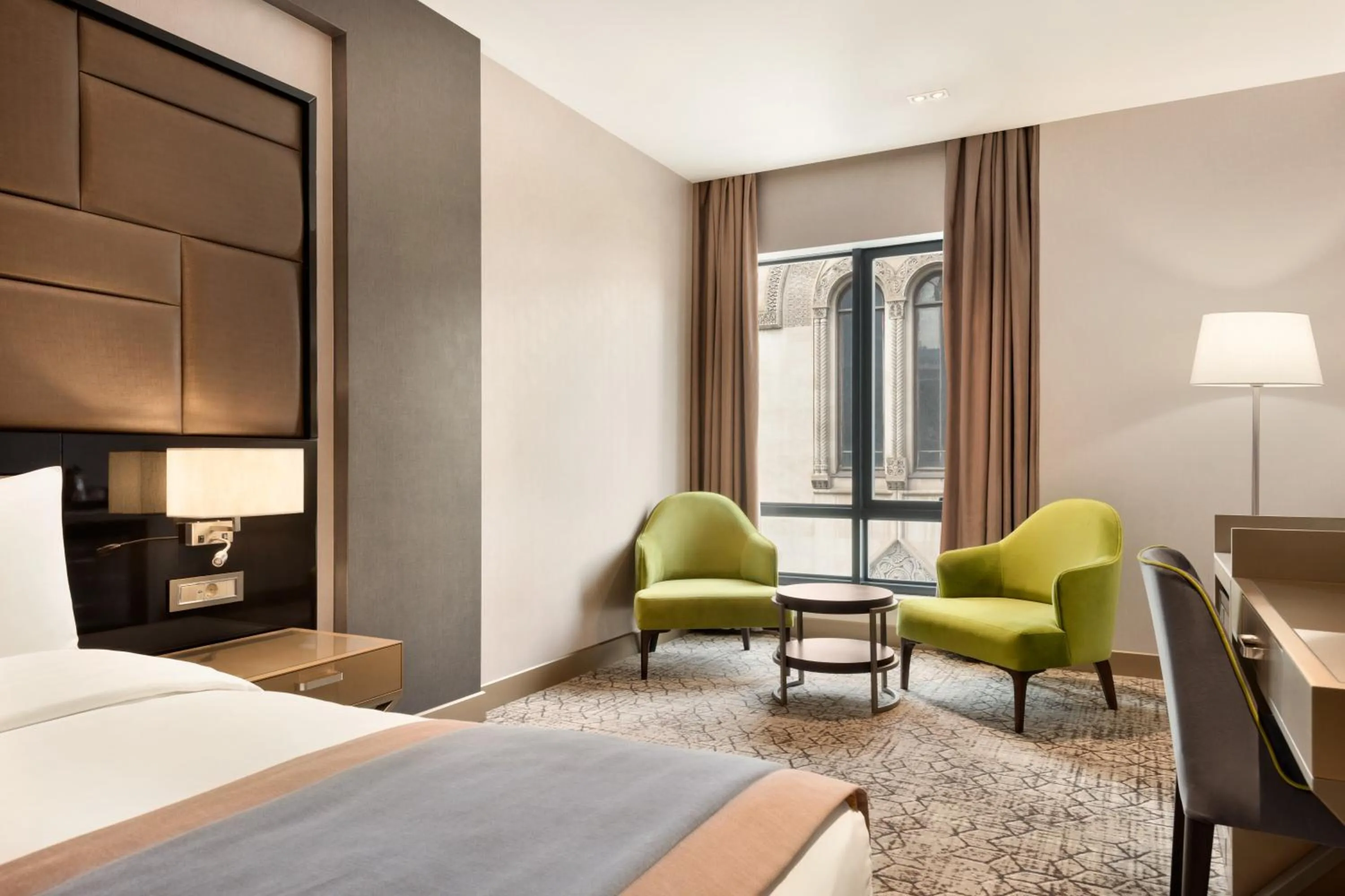 Seating area, Bed in Wyndham Grand Tbilisi