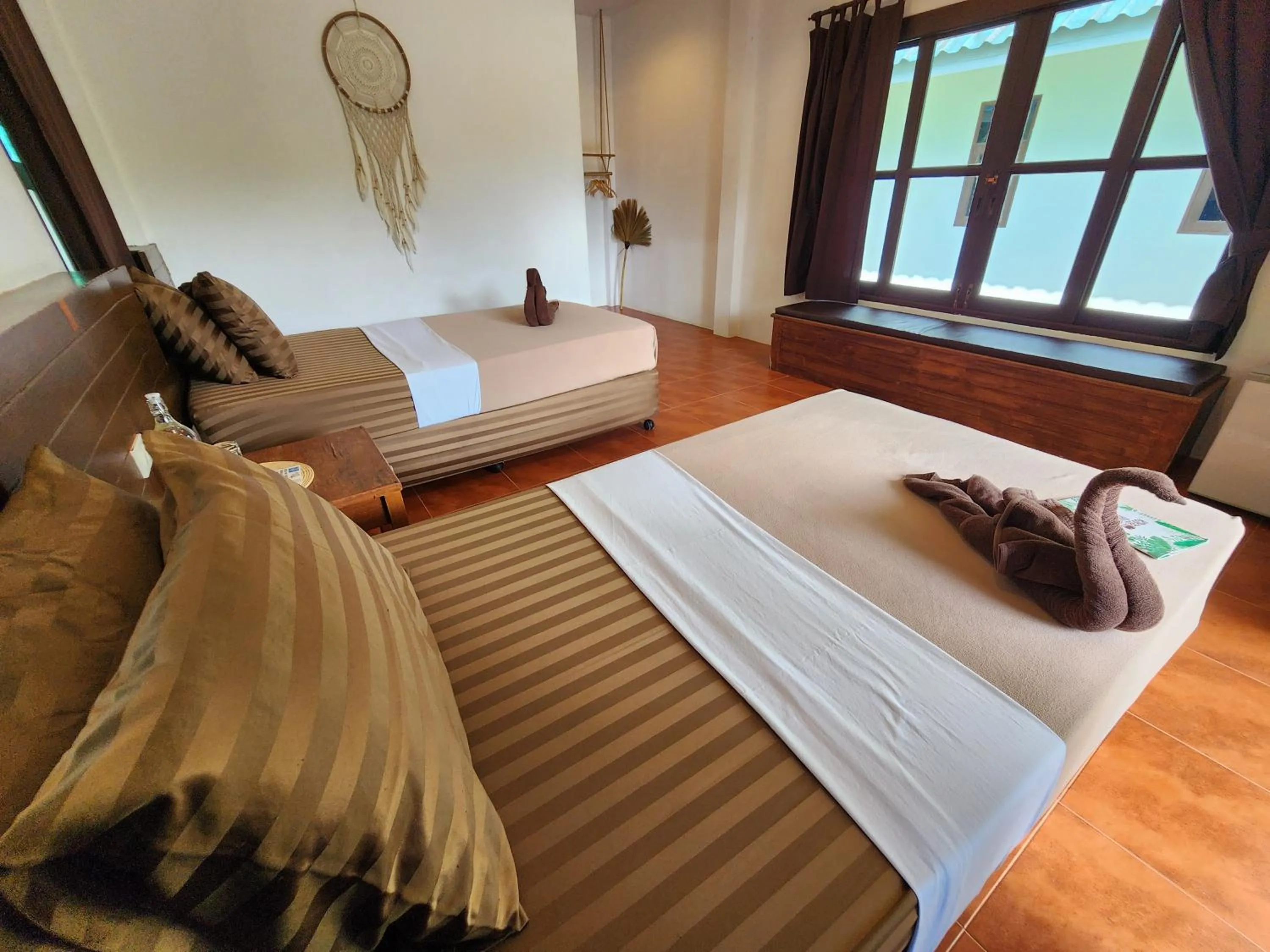 Bed in Tiki Beach Koh Phangan Beach Restaurant Bar and Coworking