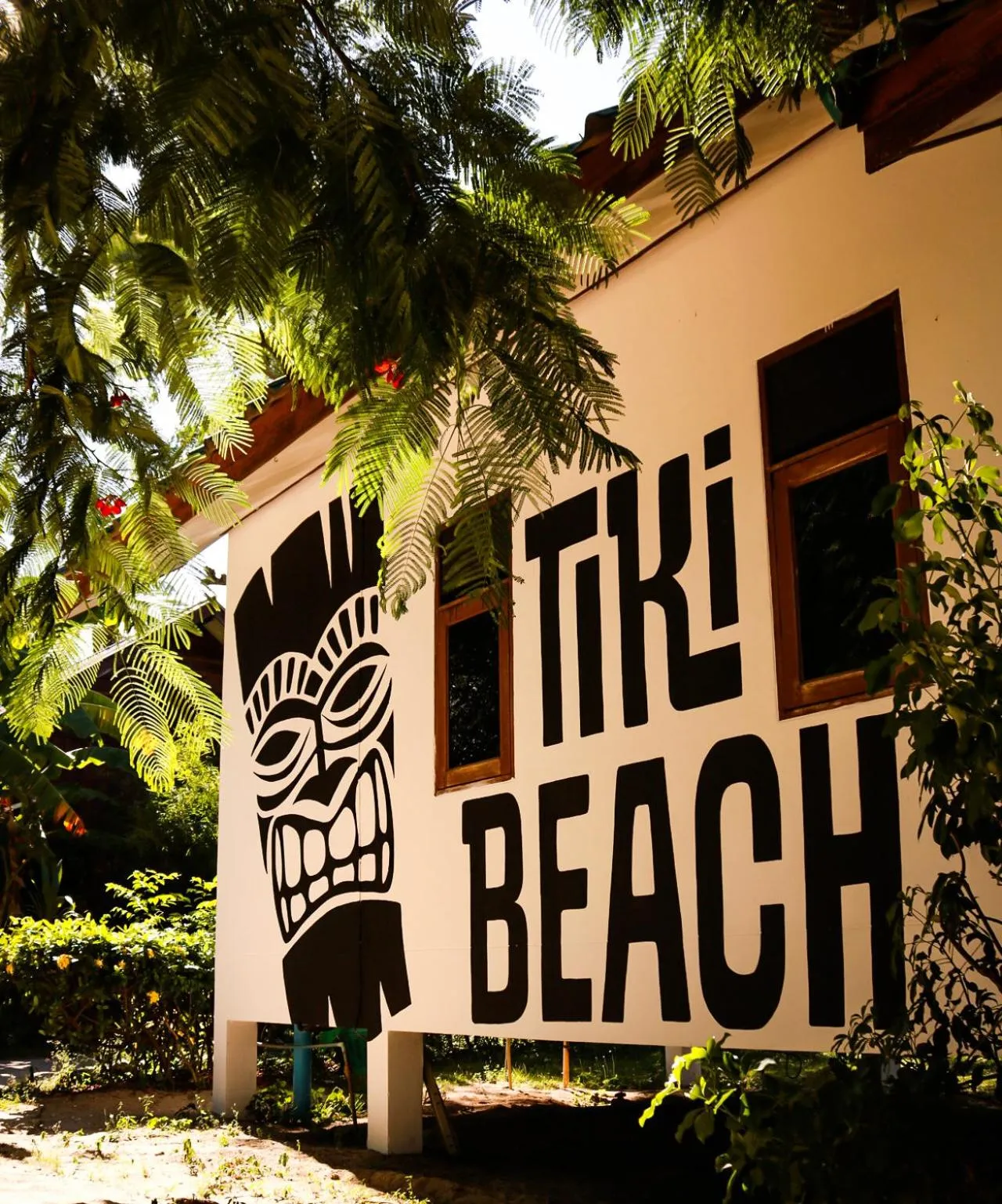 Property logo or sign in Tiki Beach Koh Phangan Beach Restaurant Bar and Coworking