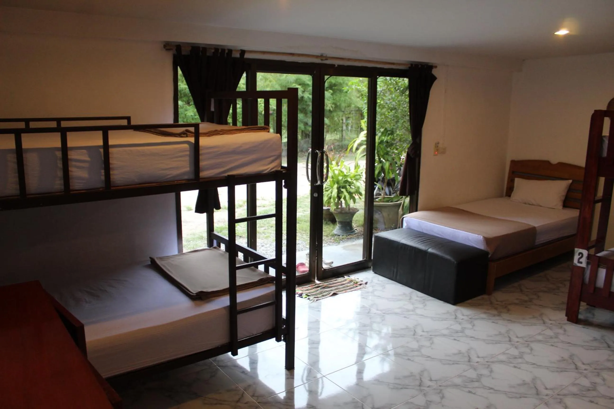 Bed in Tiki Beach Koh Phangan Beach Restaurant Bar and Coworking