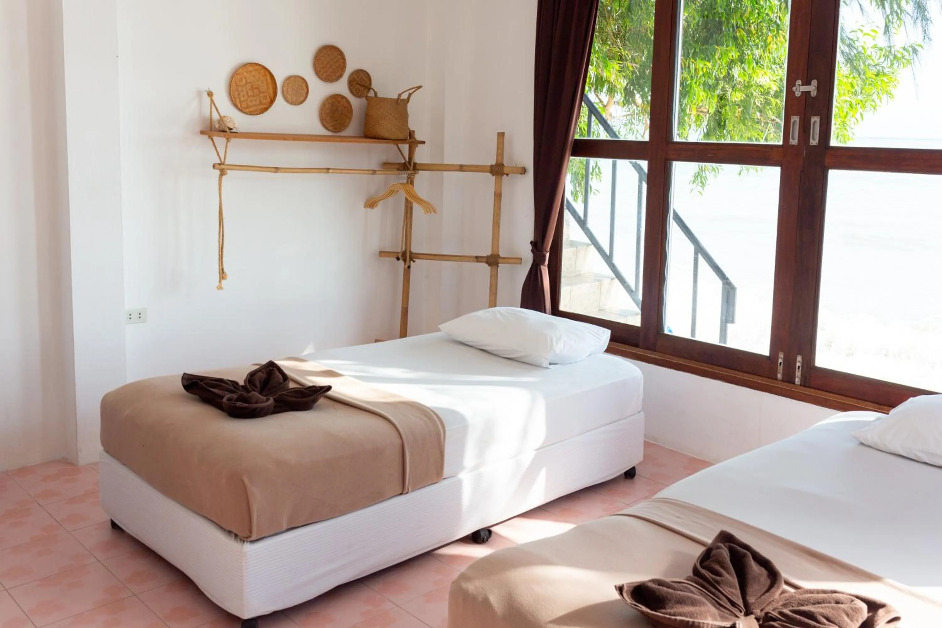 Bed in Tiki Beach Koh Phangan Beach Restaurant Bar and Coworking