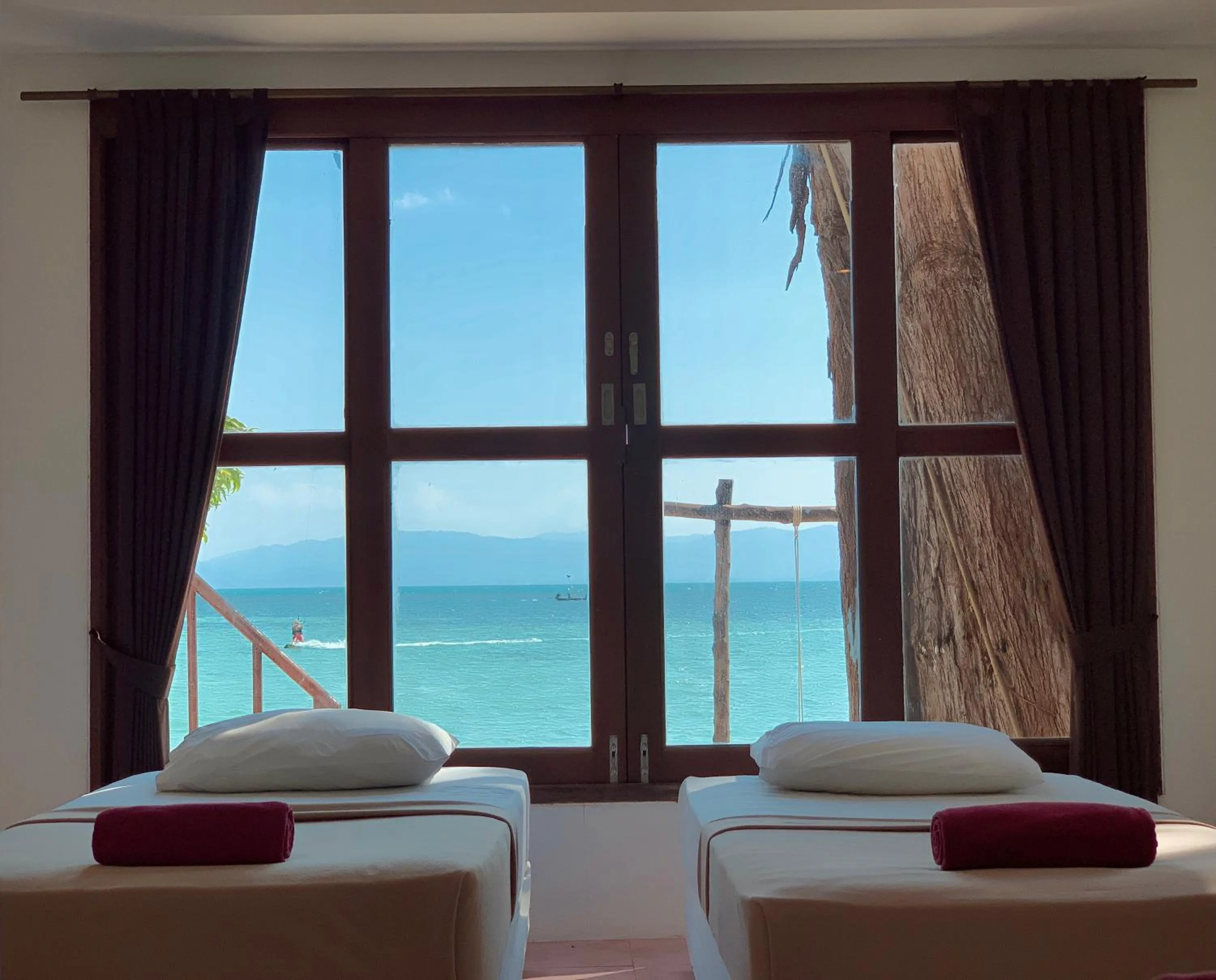 Bed in Tiki Beach Koh Phangan Beach Restaurant Bar and Coworking