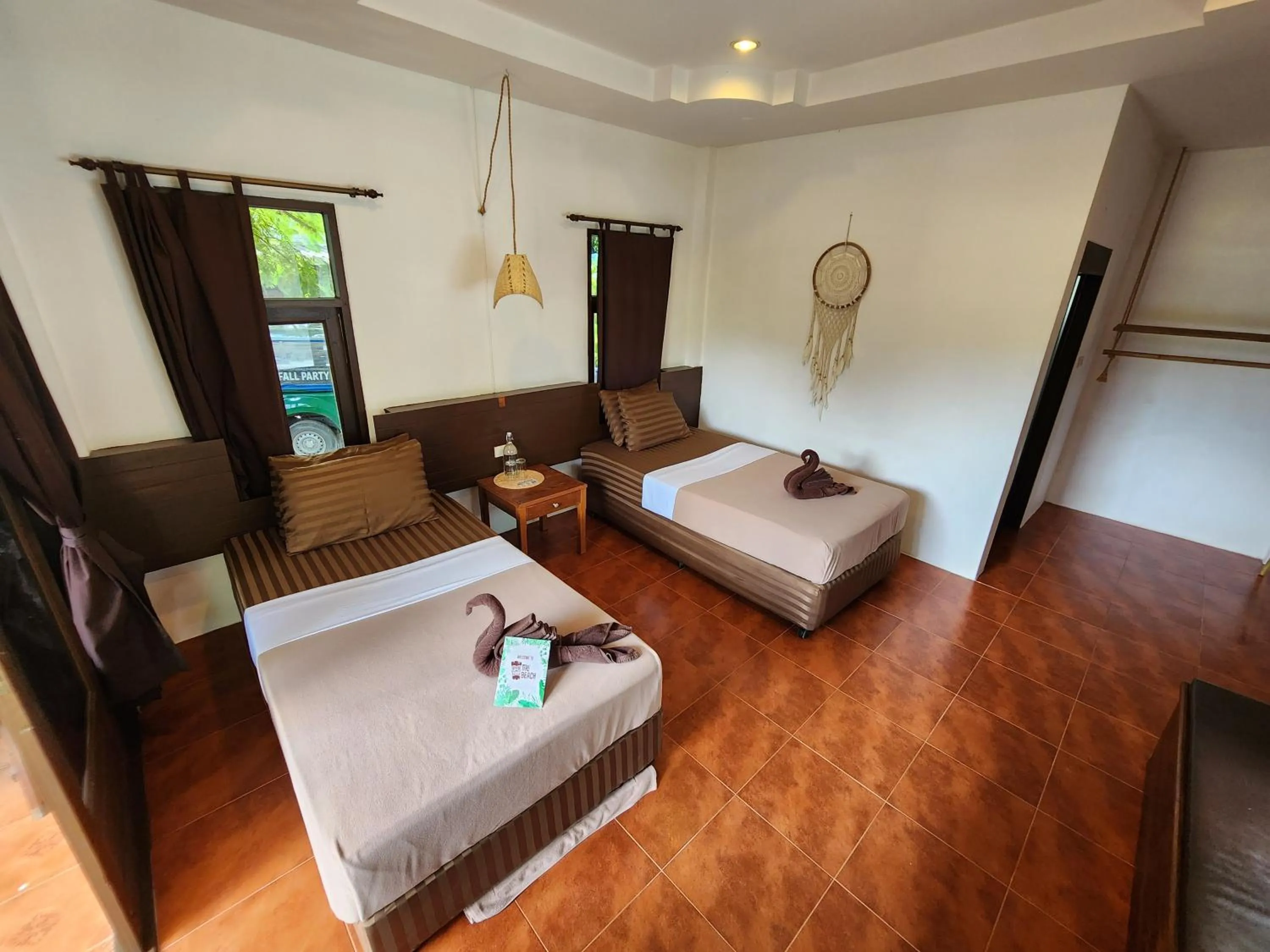 Bed in Tiki Beach Koh Phangan Beach Restaurant Bar and Coworking