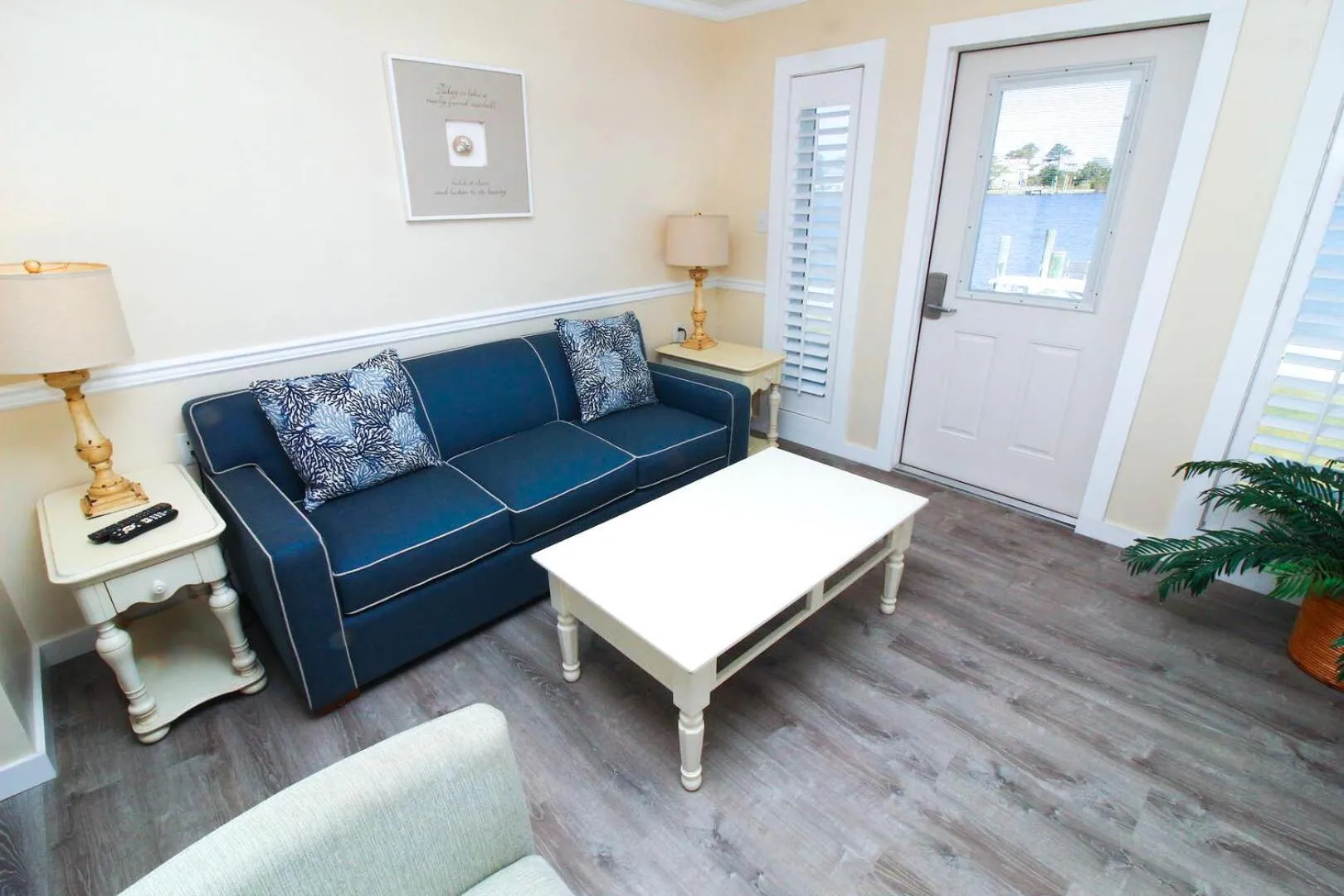 Living room in Fin 'N Feather Waterside Inn by Kees Vacations