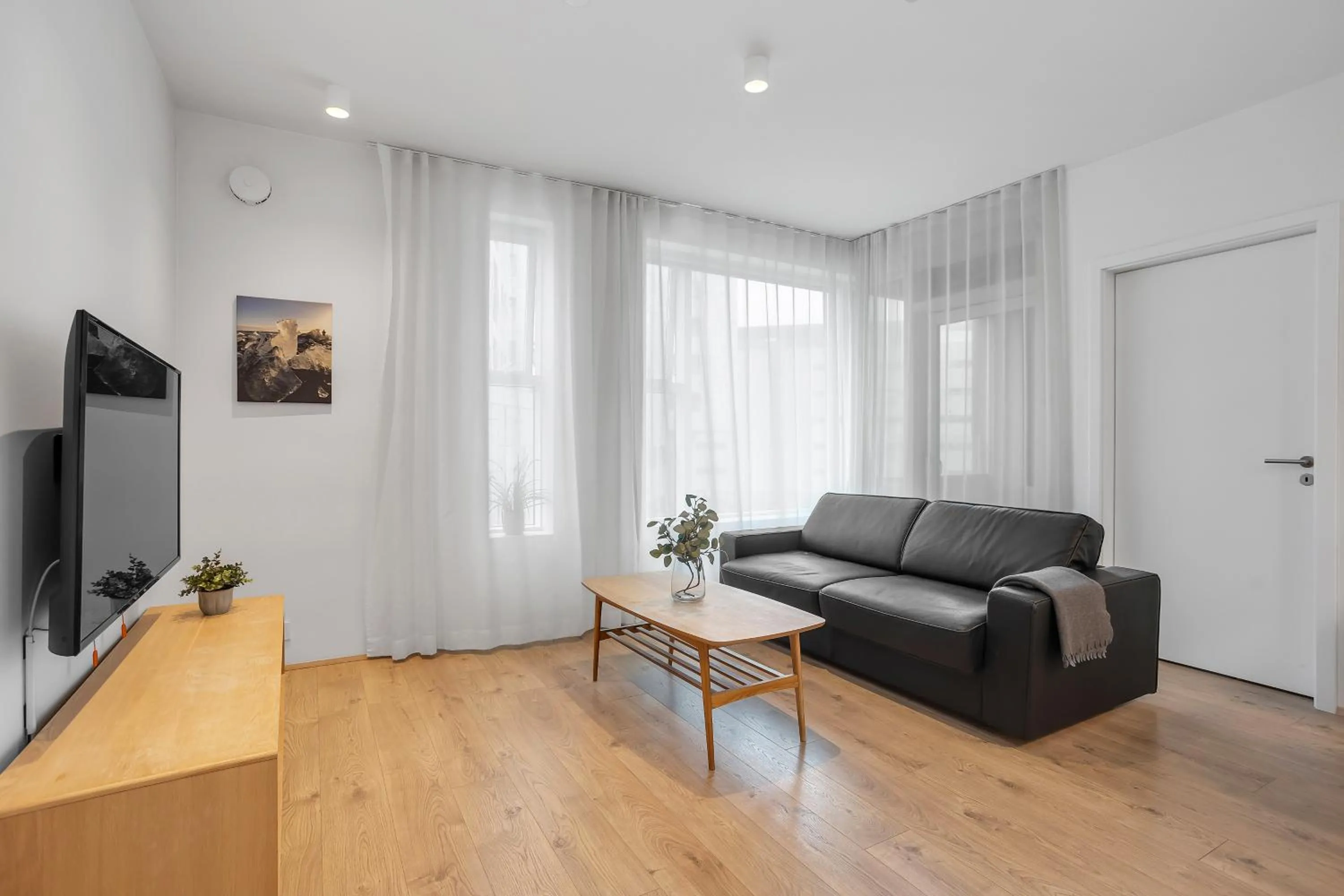 Communal lounge/ TV room in Sif Apartments by Heimaleiga