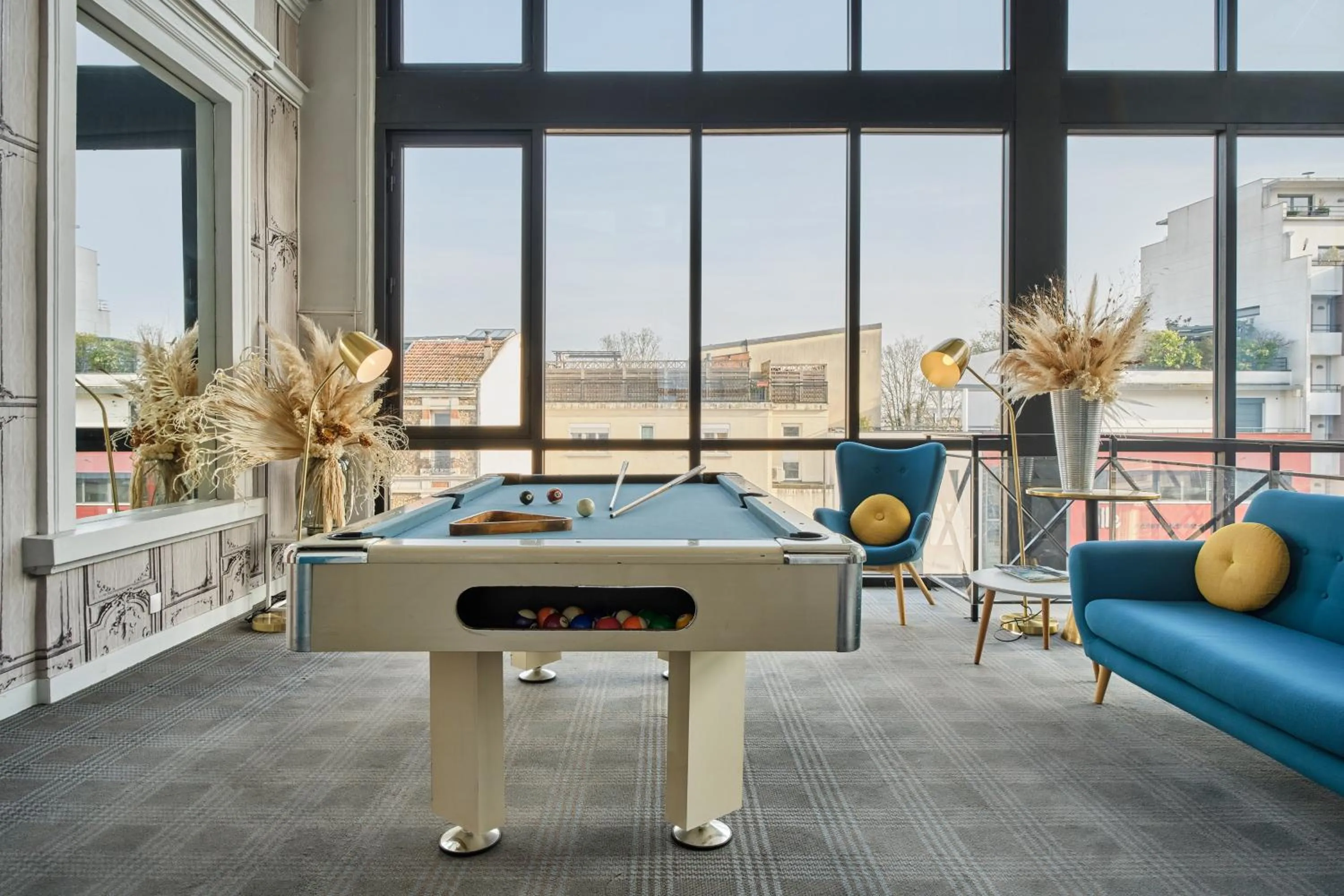 Billiard in Hotel Atrium by Happyculture