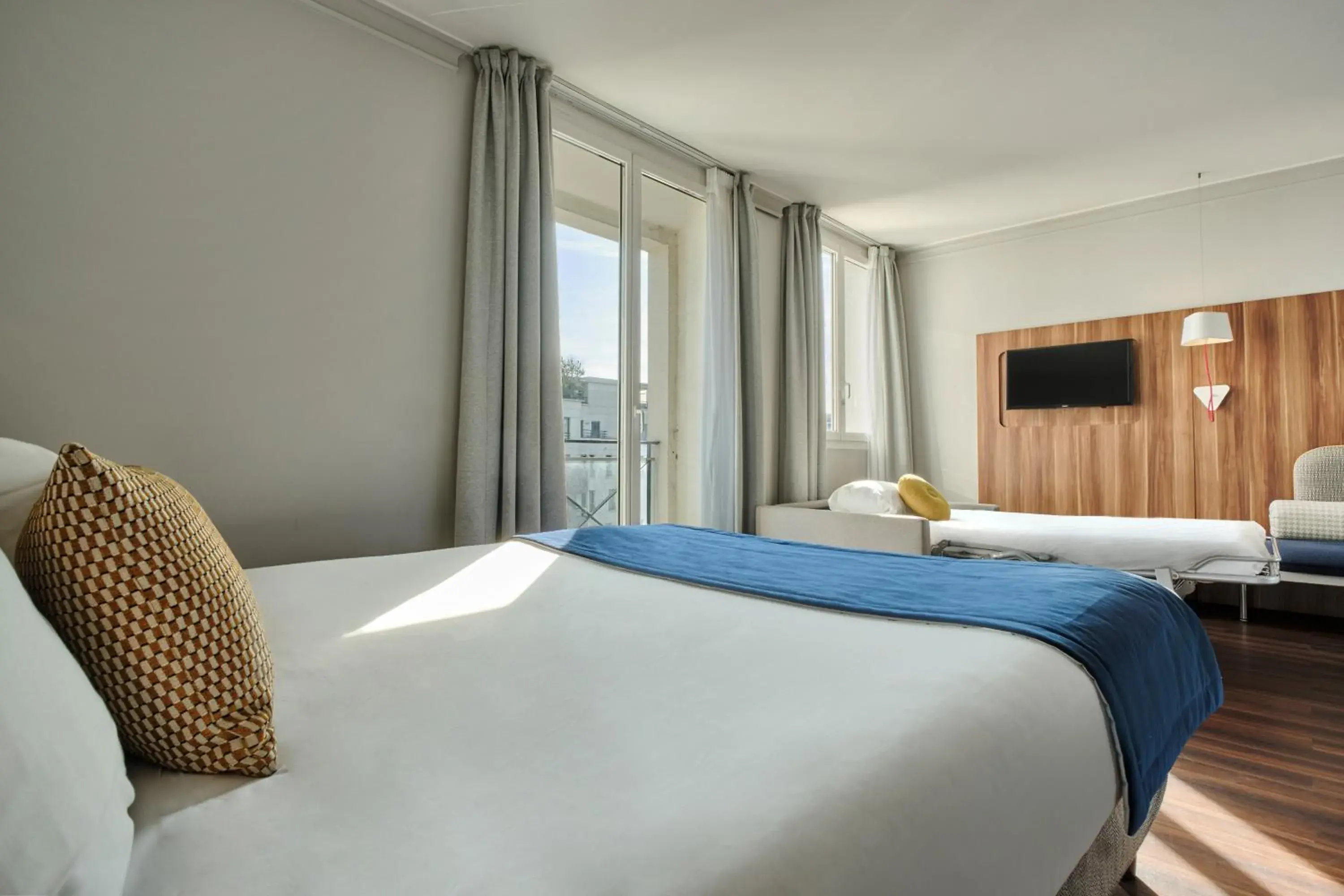 Bed in Hotel Atrium by Happyculture Bed in Hotel Atrium by Happyculture