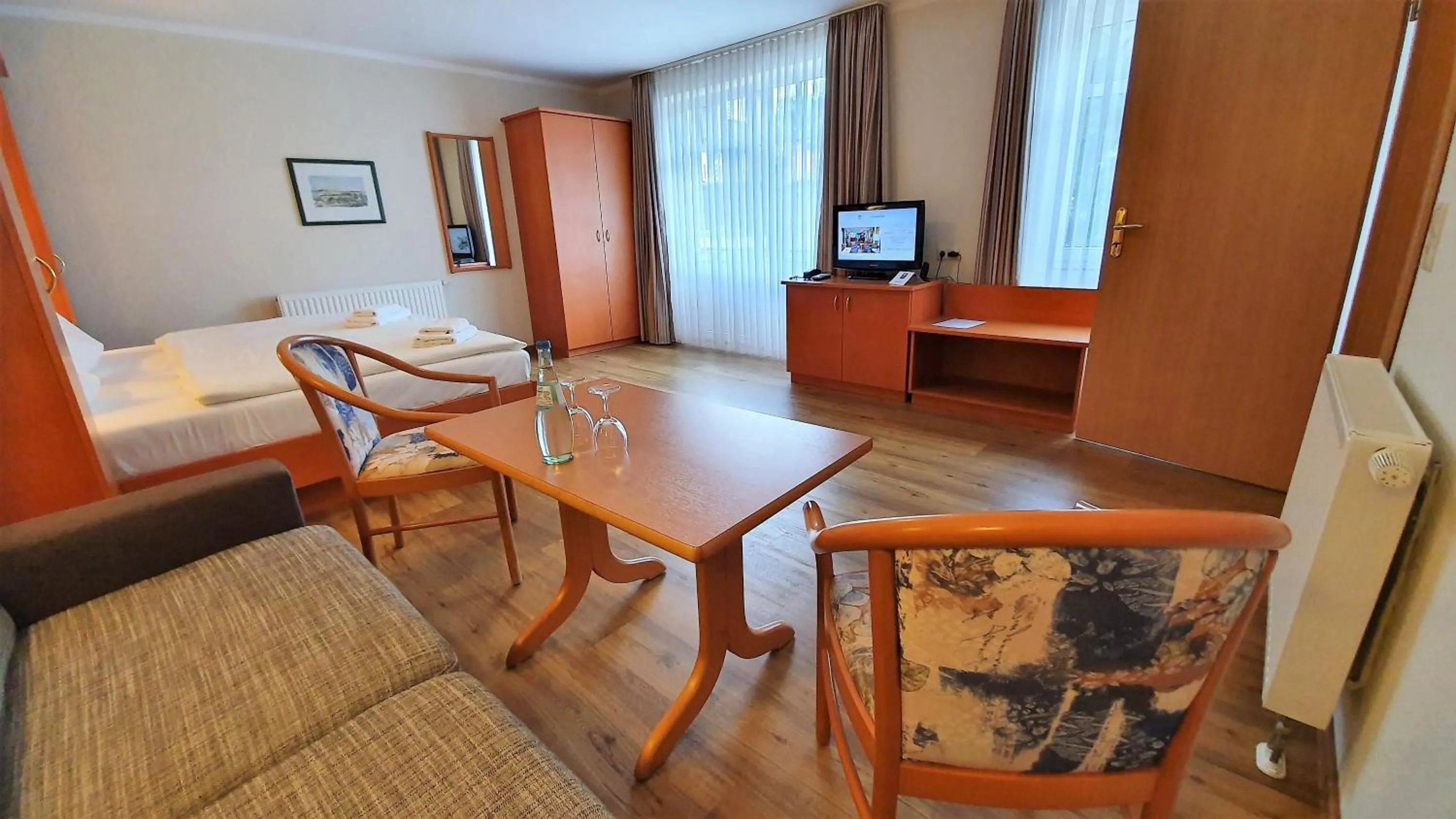 Living room, Bed in R&R Villen Baabe