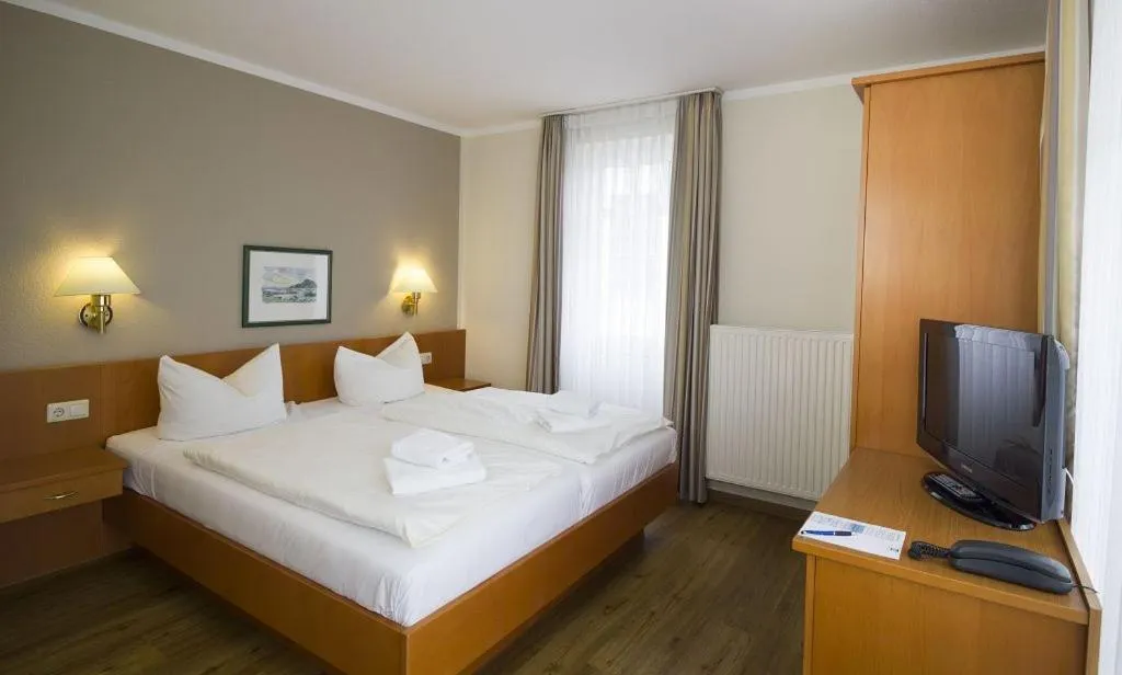 Photo of the whole room, Bed in R&R Villen Baabe