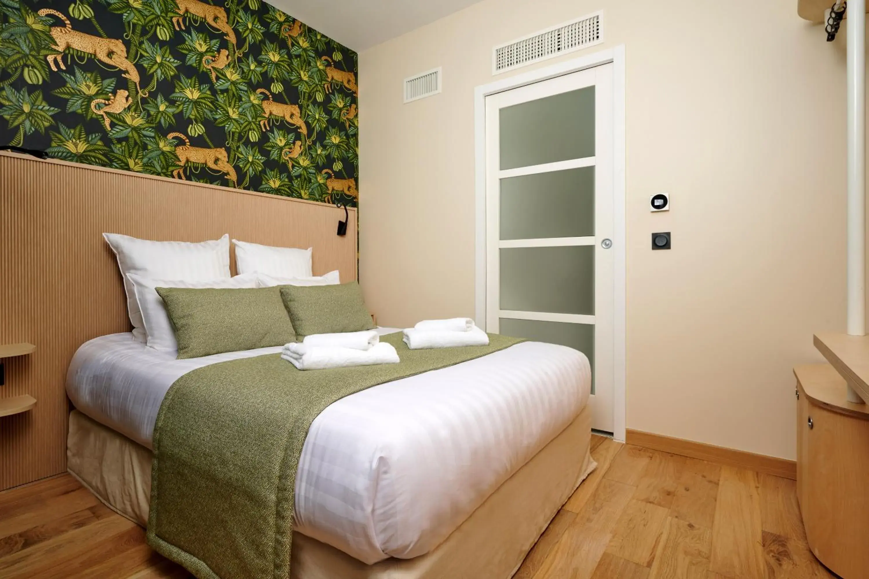 Bed in VLH Montparnasse Eiffel Bed in VLH Montparnasse Eiffel