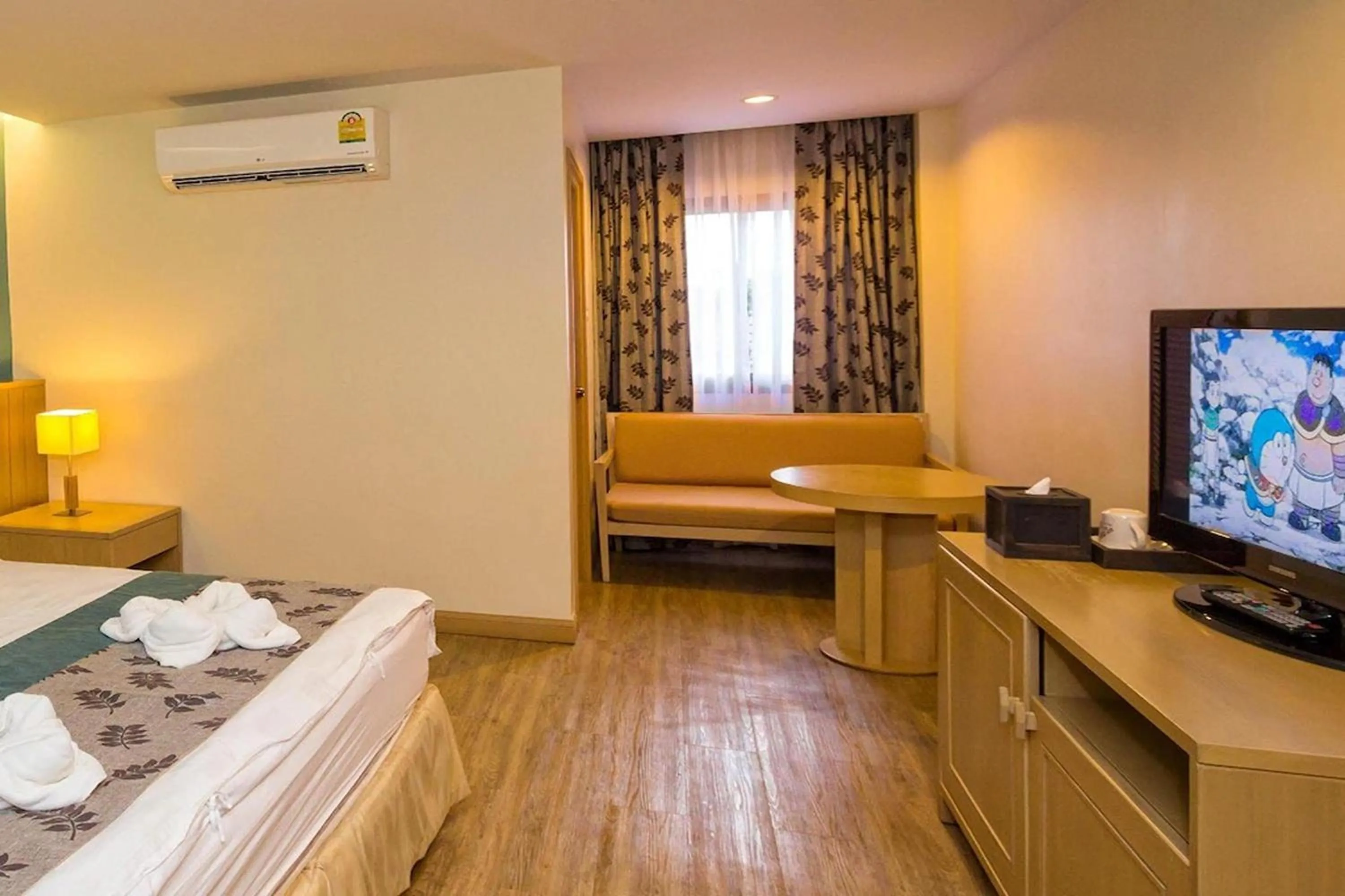 Bed in Panya Resort Hotel