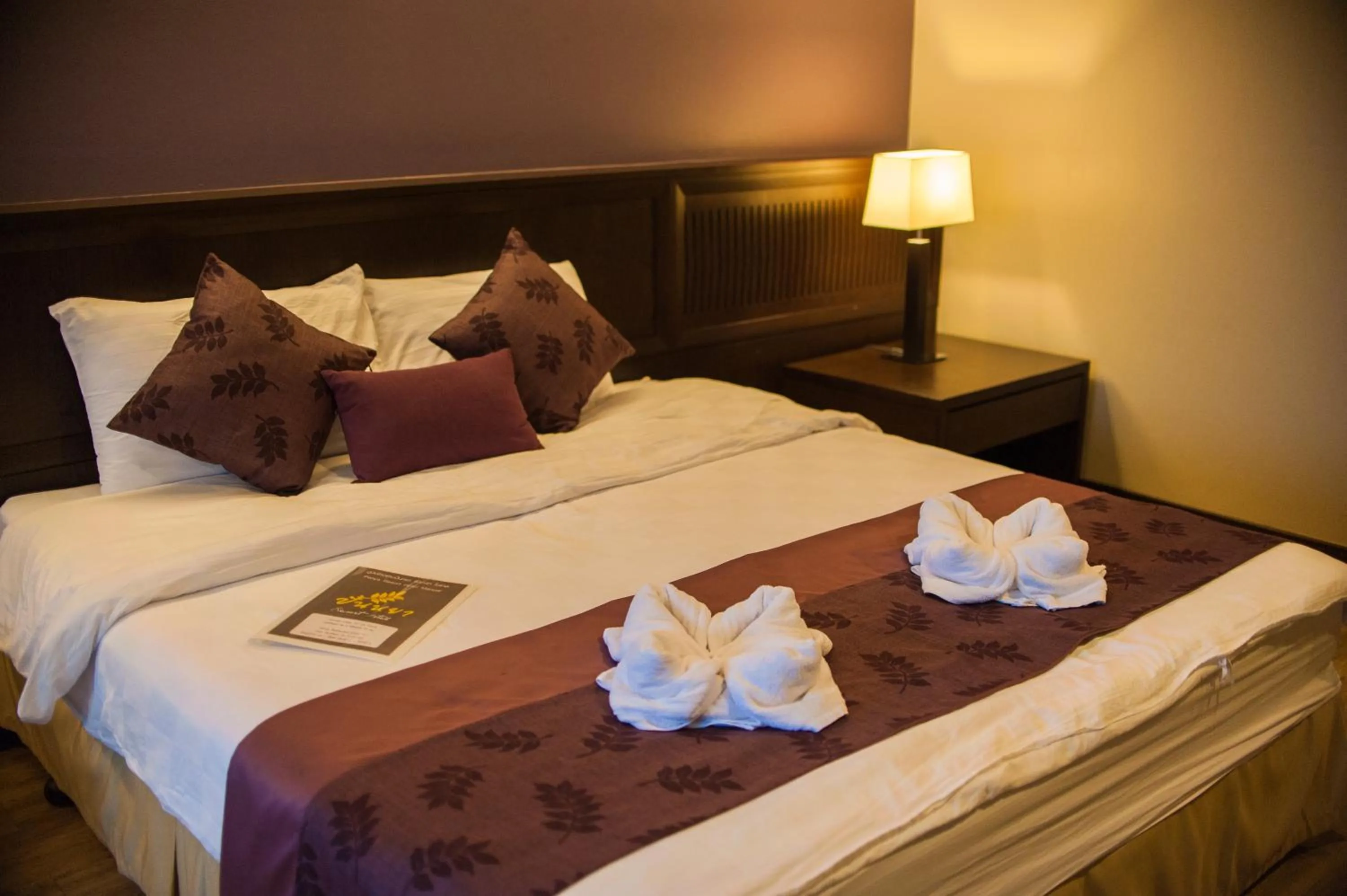 Bed in Panya Resort Hotel