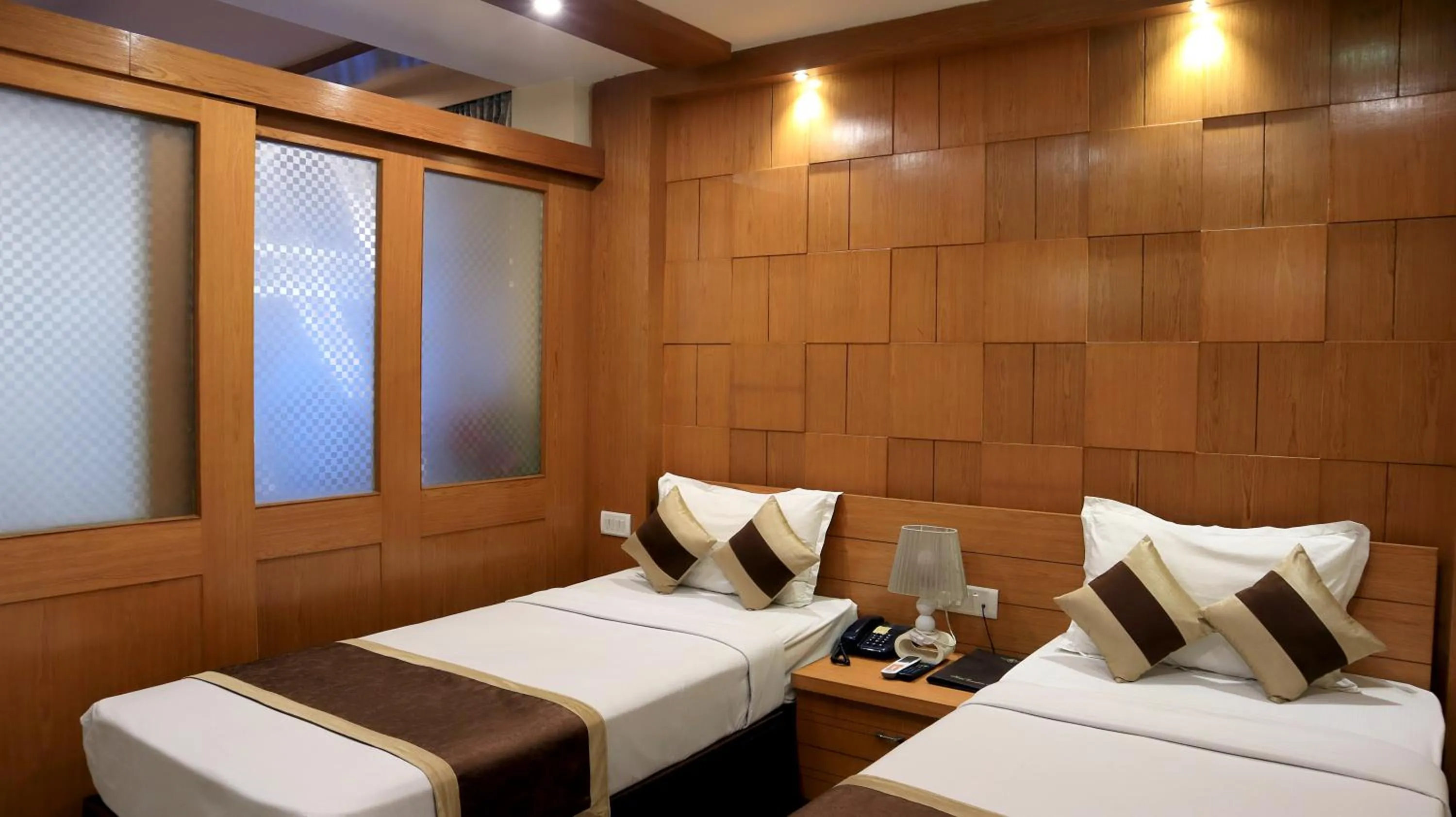 Bed in Hotel Executive Tower