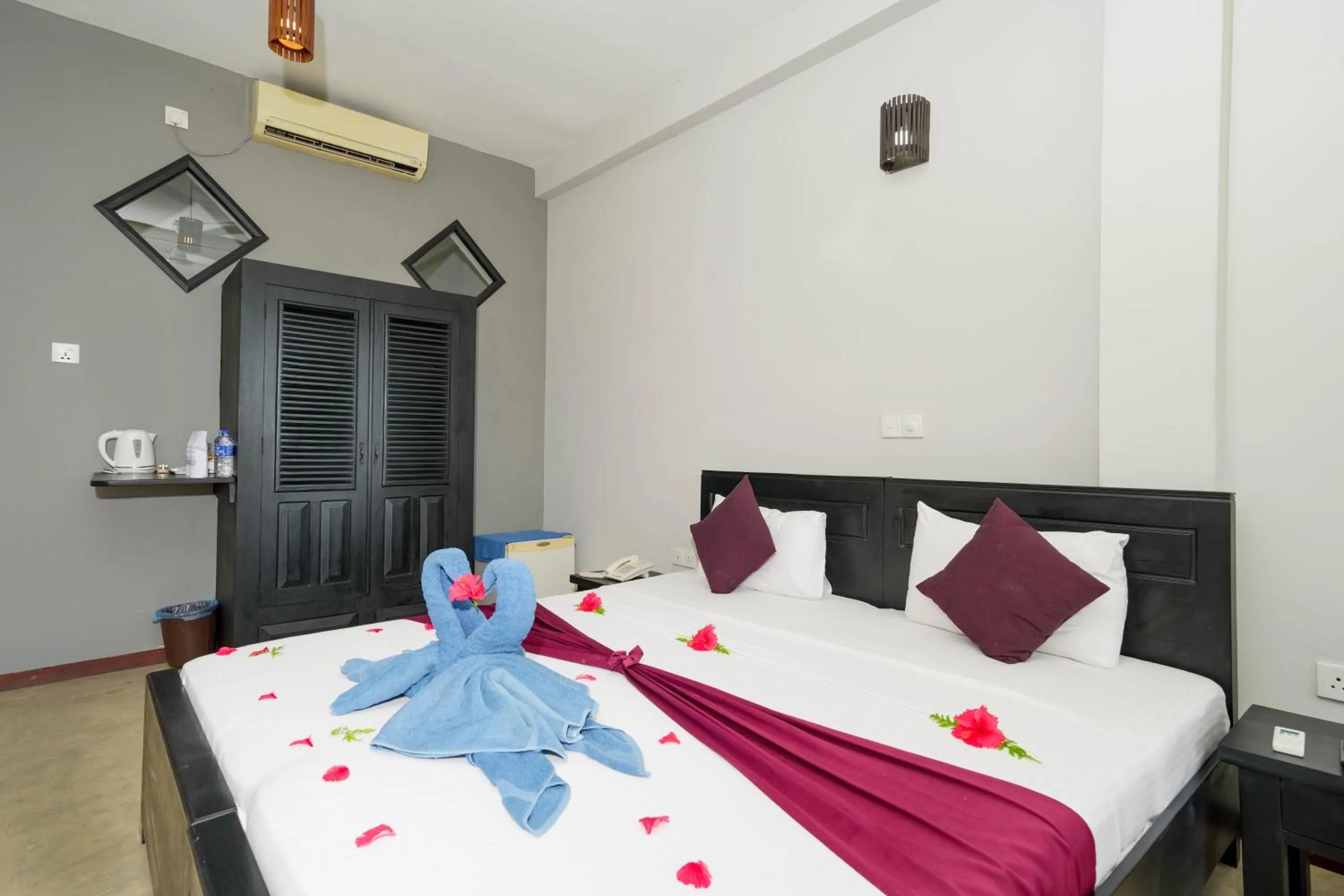 Bed in Hotel Silan Mo