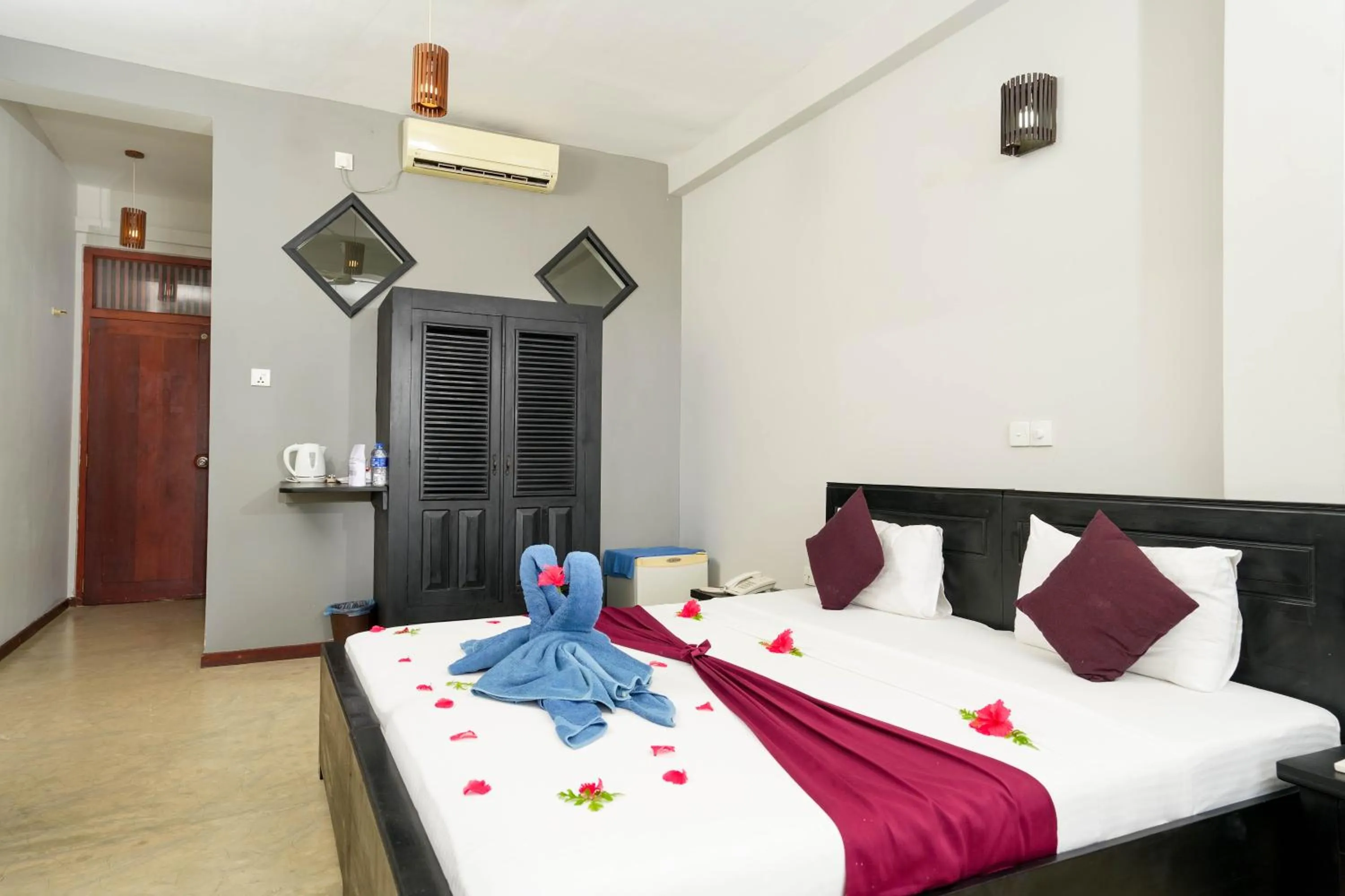 Bed in Hotel Silan Mo