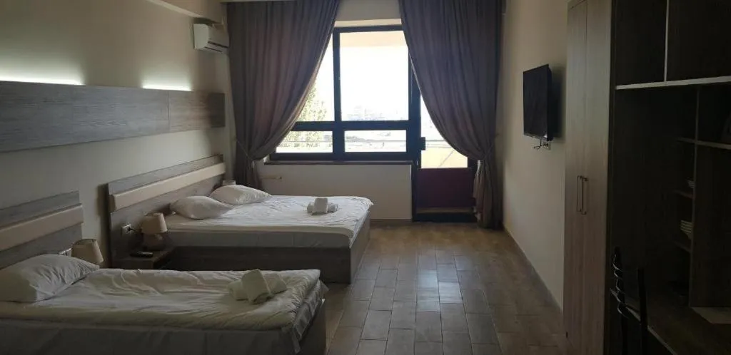 Bed in Cross Resort Hotel