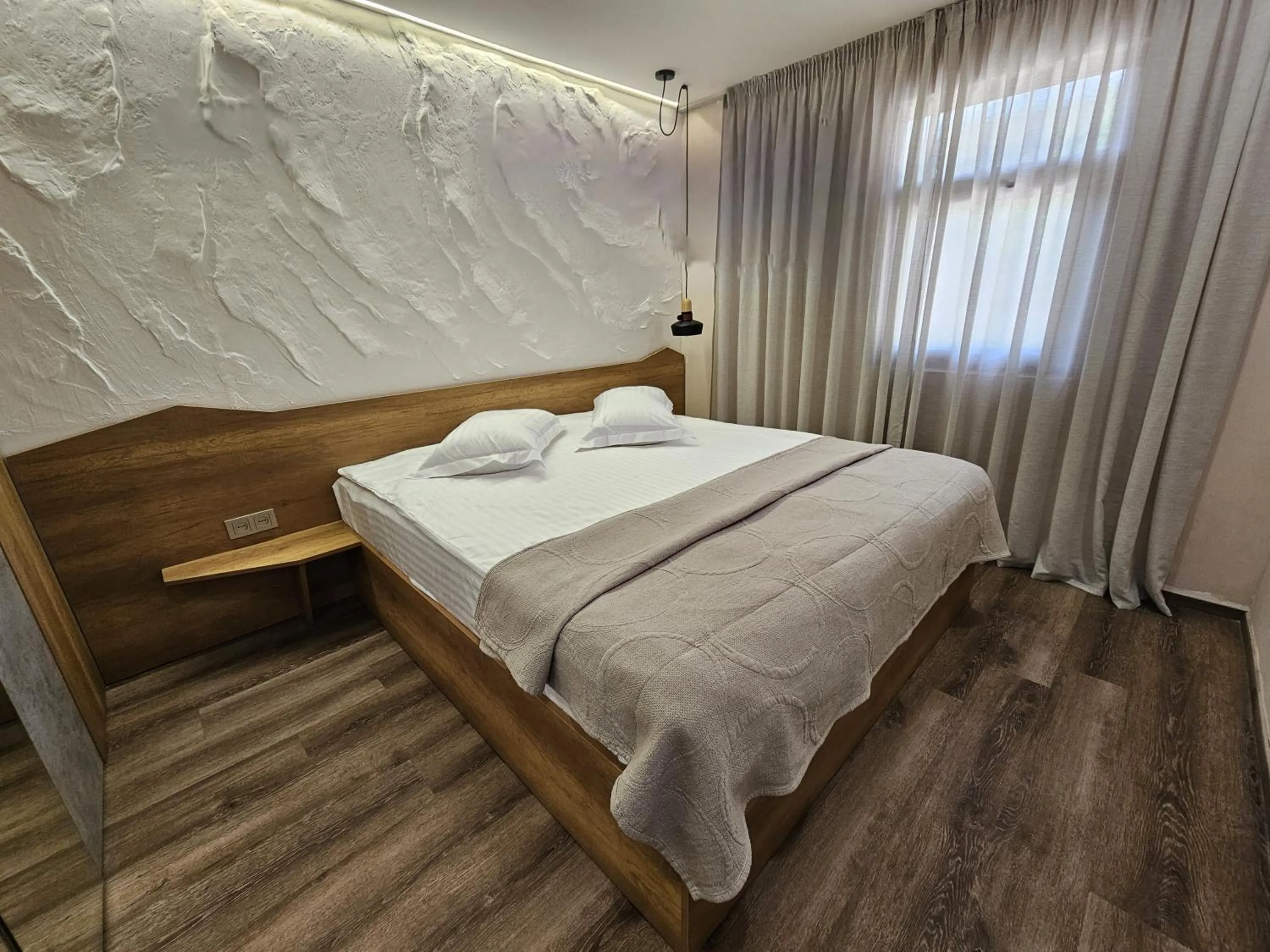 Bed in Cross Resort Hotel