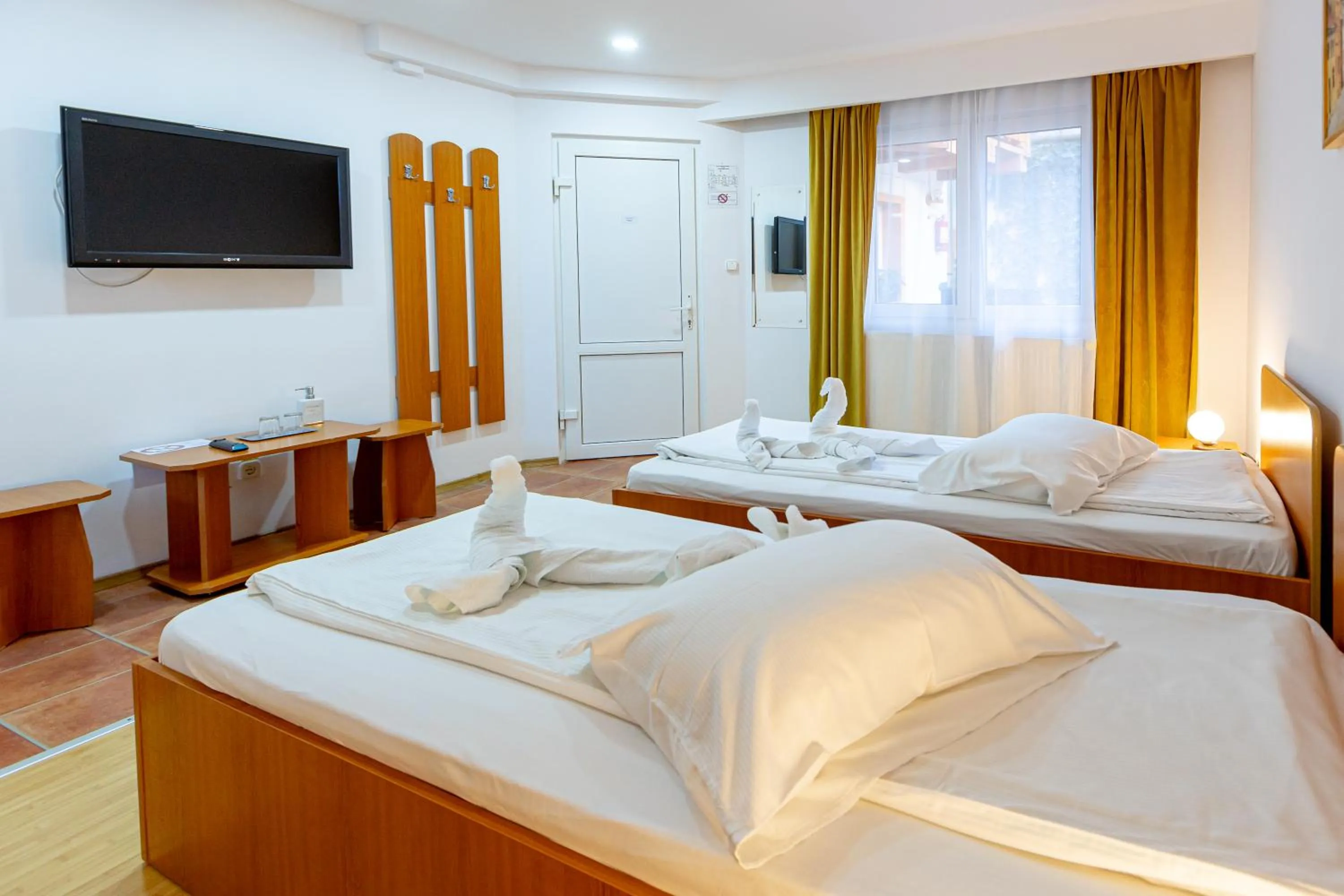 Photo of the whole room, Bed in Pensiunea Joker